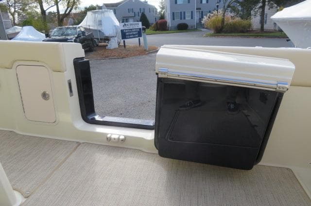 2025 Chris-Craft Catalina 28 boat interior, featuring a sleek door and storage compartment.