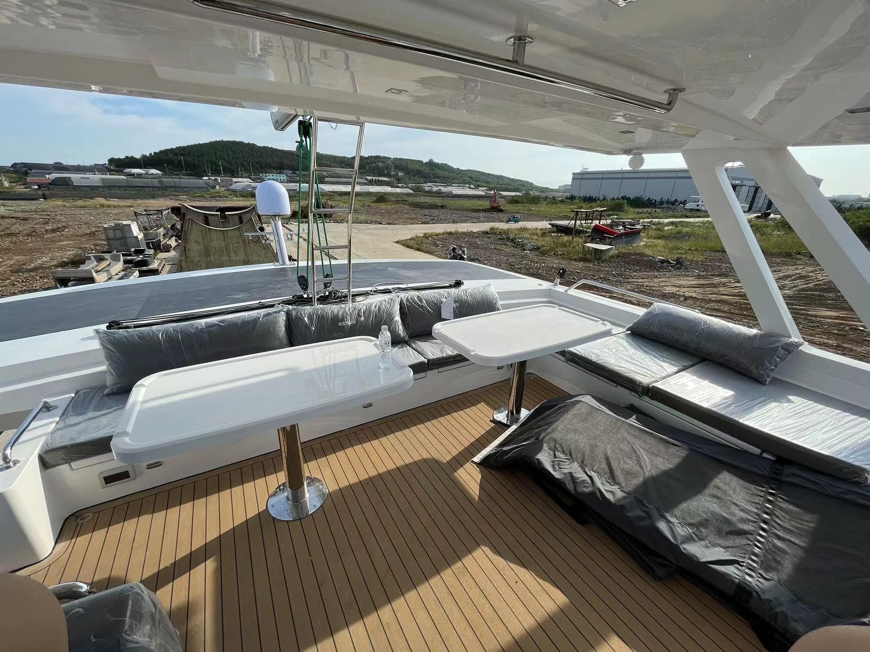 Mazarin 55 Catamaran 2023 with spacious deck and seating area.