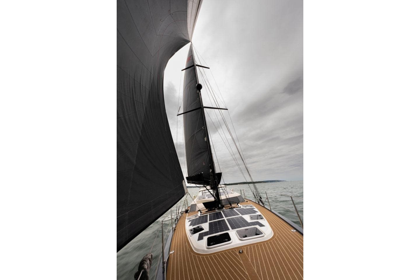 Sailing yacht Pegasus 50, 2026 model, with sleek design and solar panels on deck.