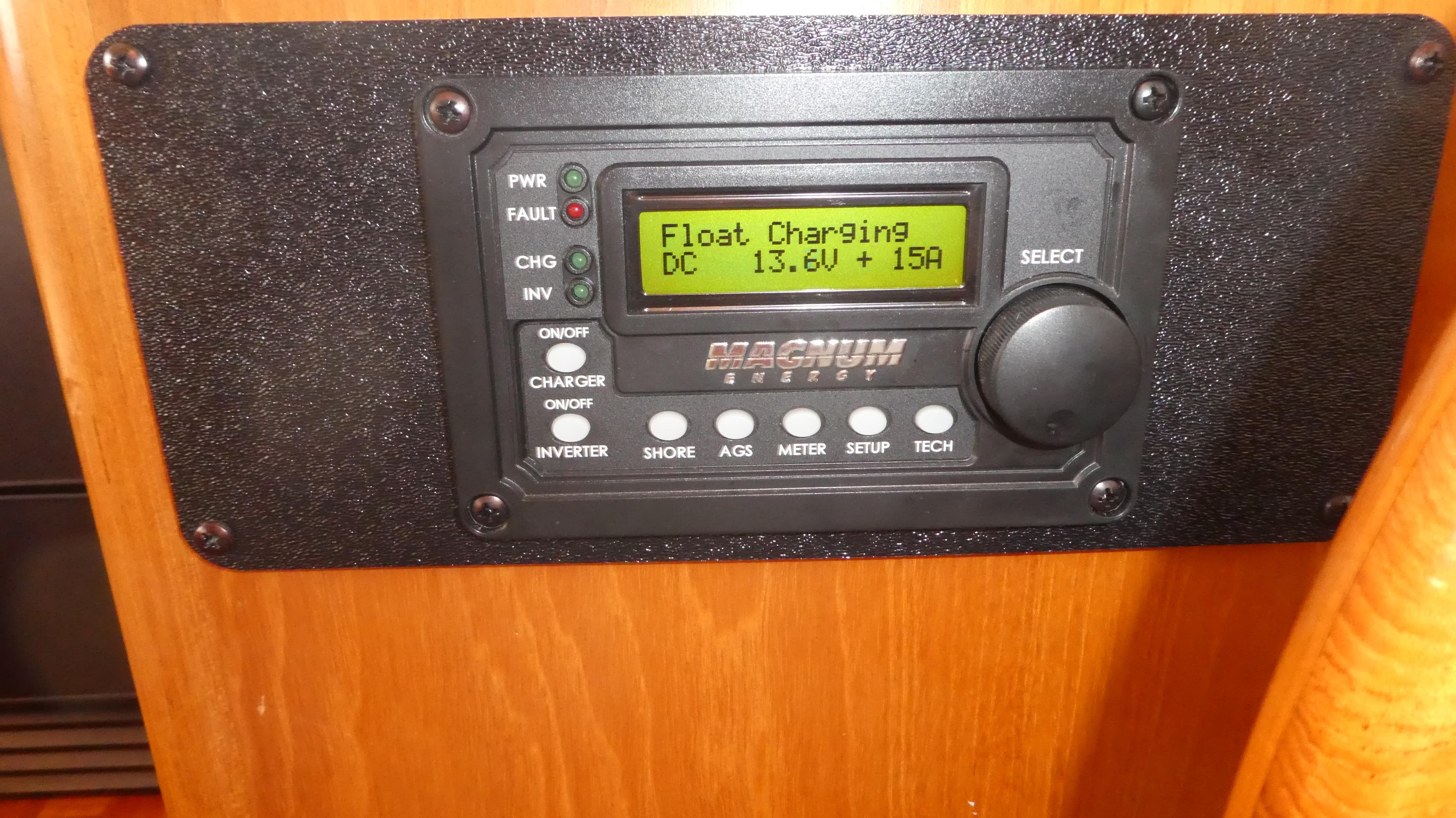 Magnum Energy control panel on 1992 Ocean Alexander 456 Classicco, displaying float charging status.