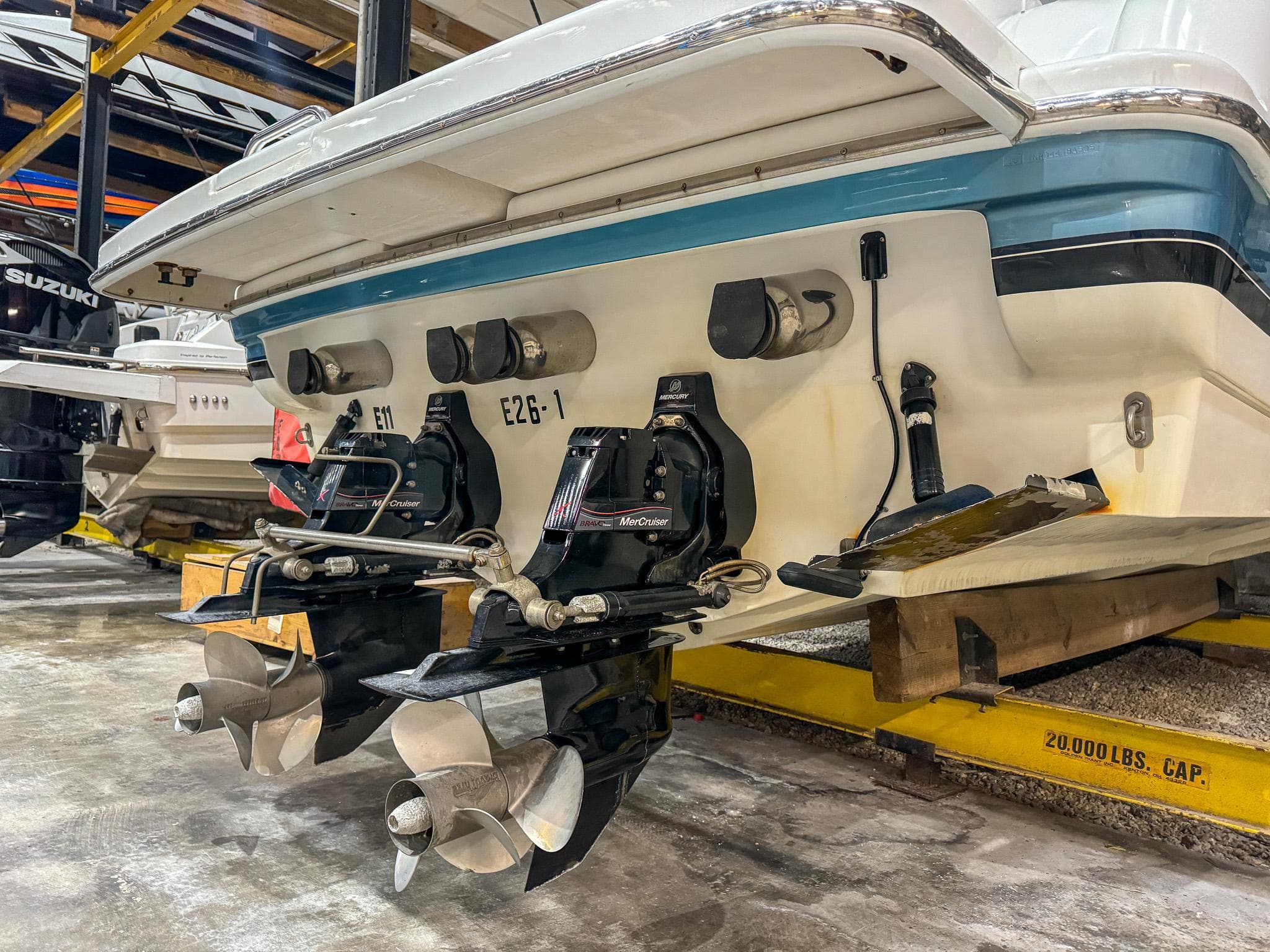 Rear view of a 2005 Formula 370 Super Sport boat in storage.