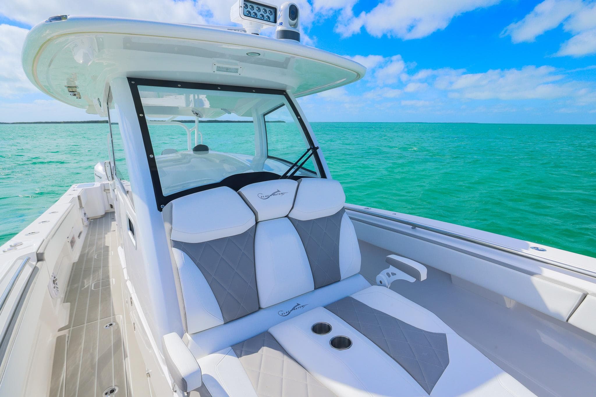 2025 Blackwater 43 Sportfish boat on turquoise ocean under blue sky.