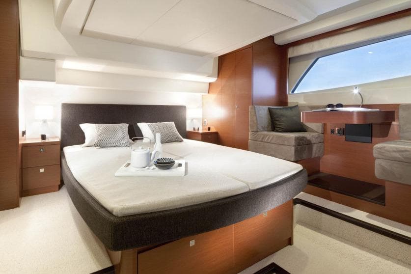 Manufacturer Provided Image: Luxurious bedroom interior of 2017 Prestige 500 S yacht with modern furnishings.
