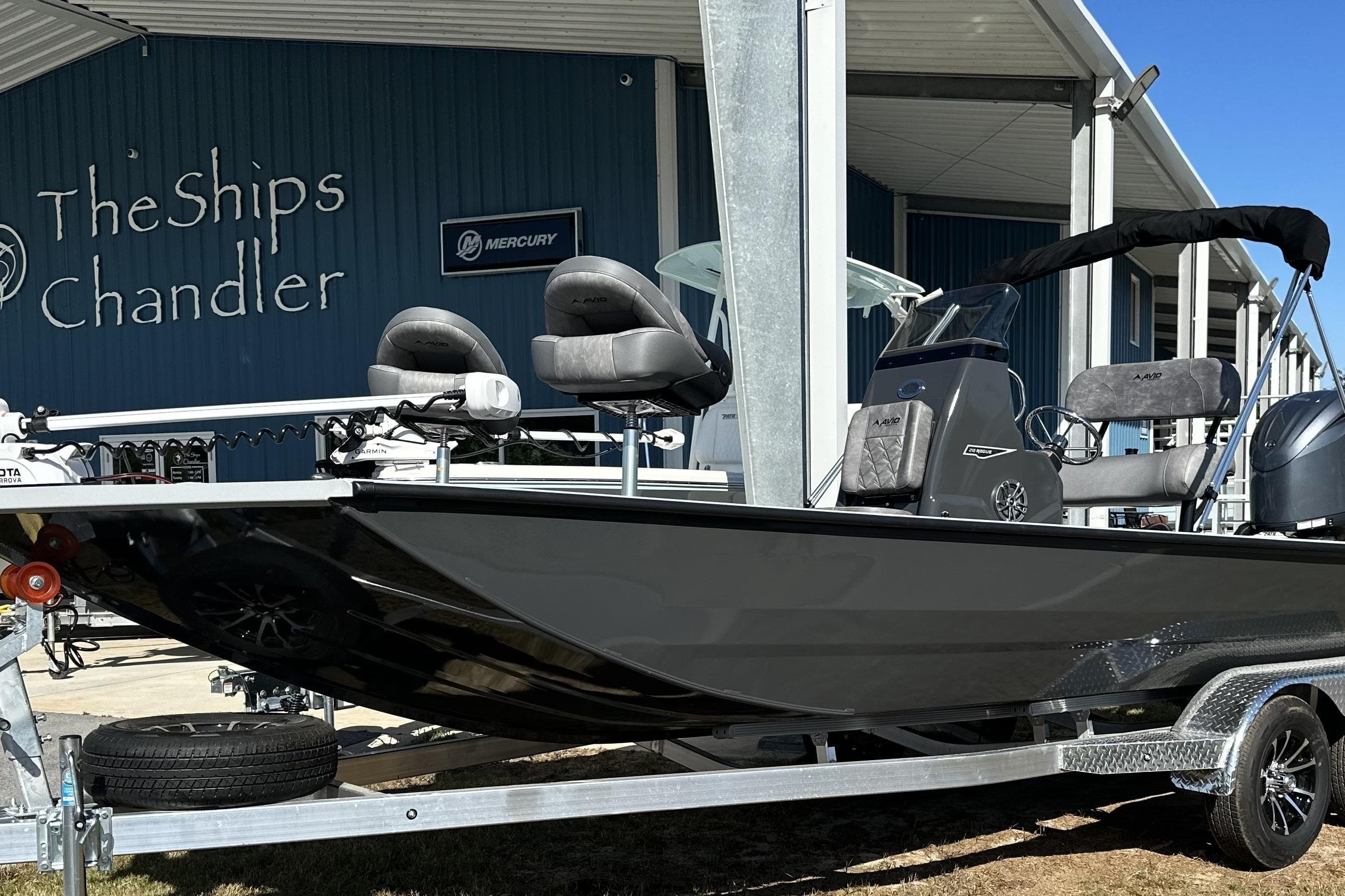 Avid 20 Rogue CC 2026 boat on trailer at The Ships Chandler dealership.