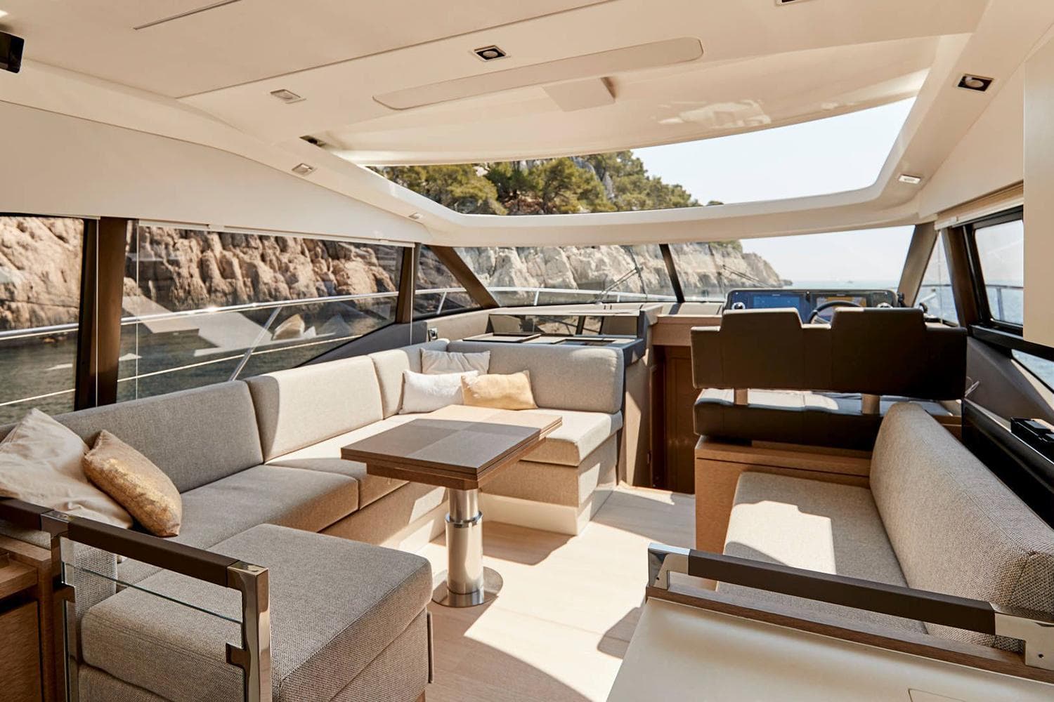Manufacturer Provided Image: Luxurious interior of 2025 Prestige 460 S yacht with elegant seating and scenic views.