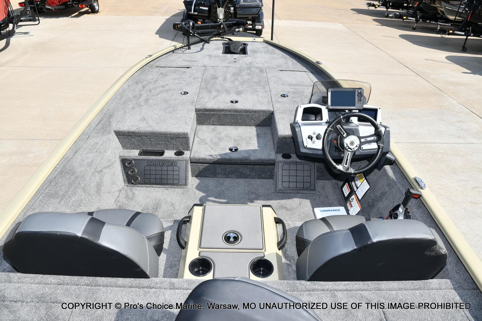 2026 Tracker Savage 215 boat interior with steering console and seating.