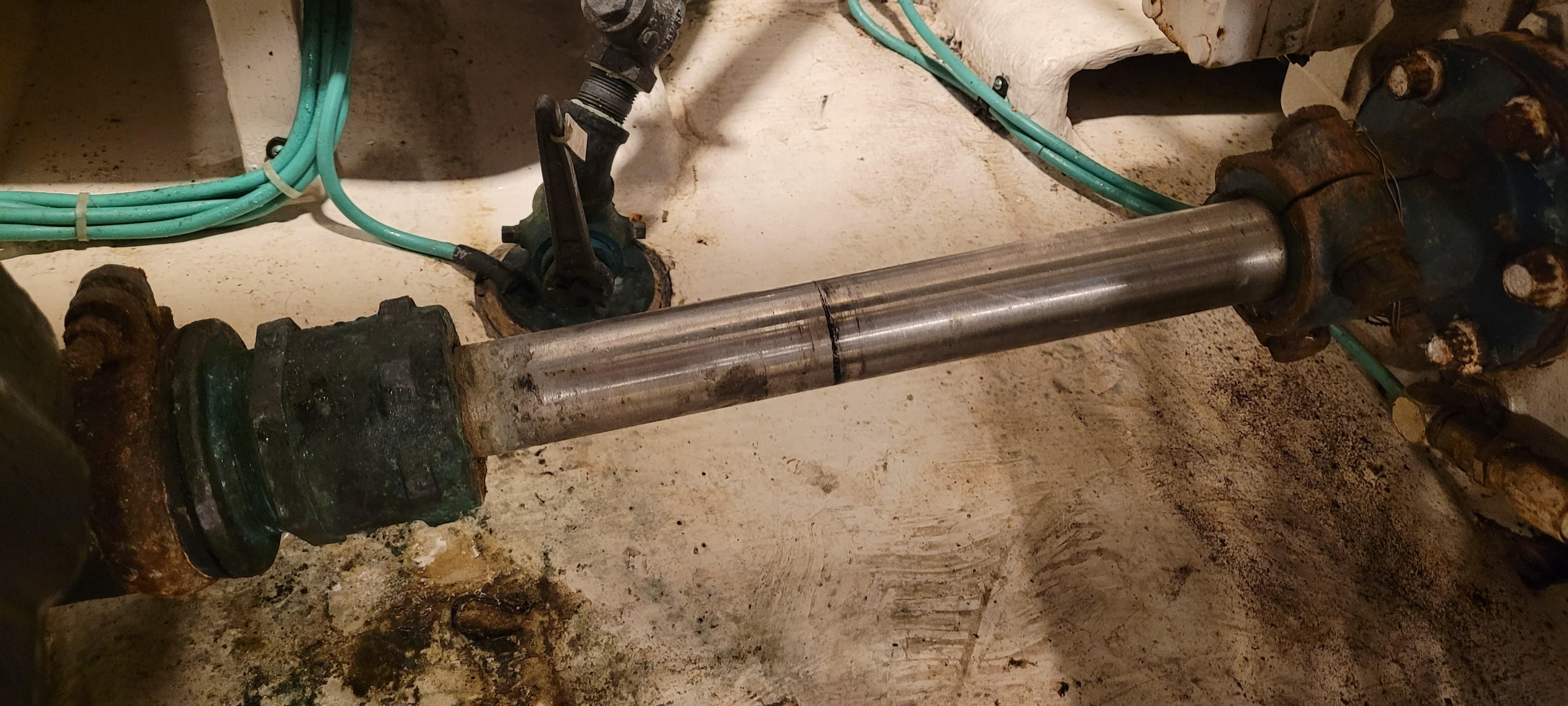 Propeller shaft of 1989 Duffy Wilbur 42 Flybridge Cruiser, showing wear and connections.