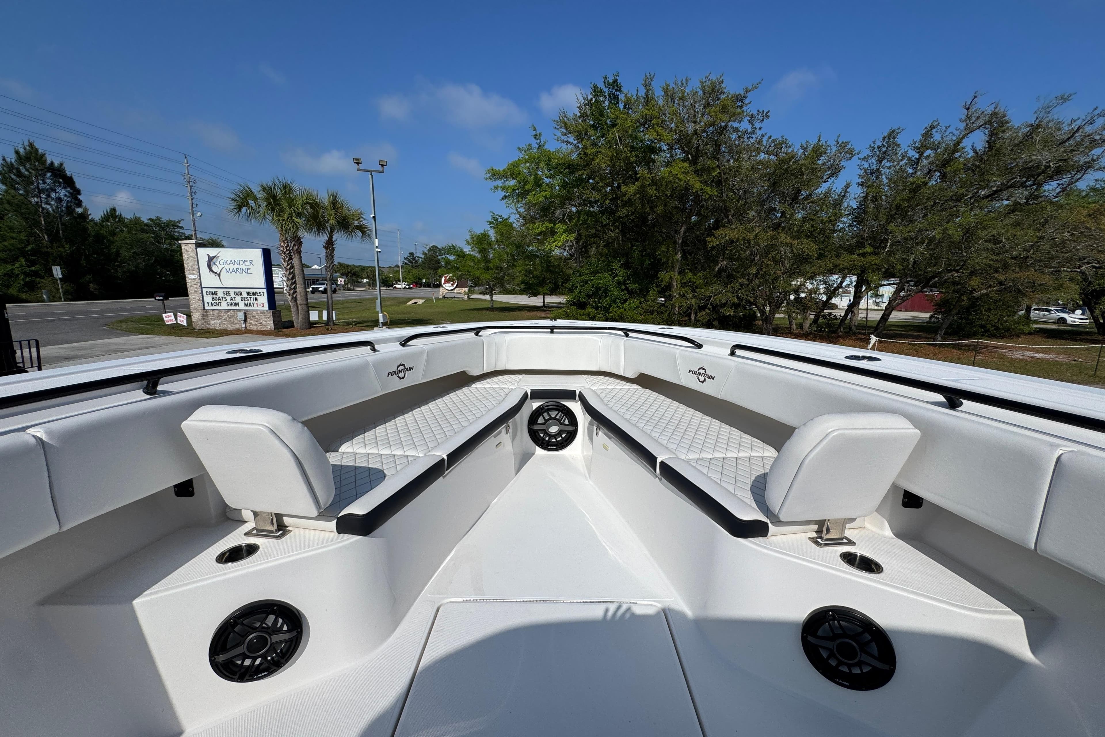 2024 Fountain Bluewater 38 Tournament Edition boat interior with seating and speakers.