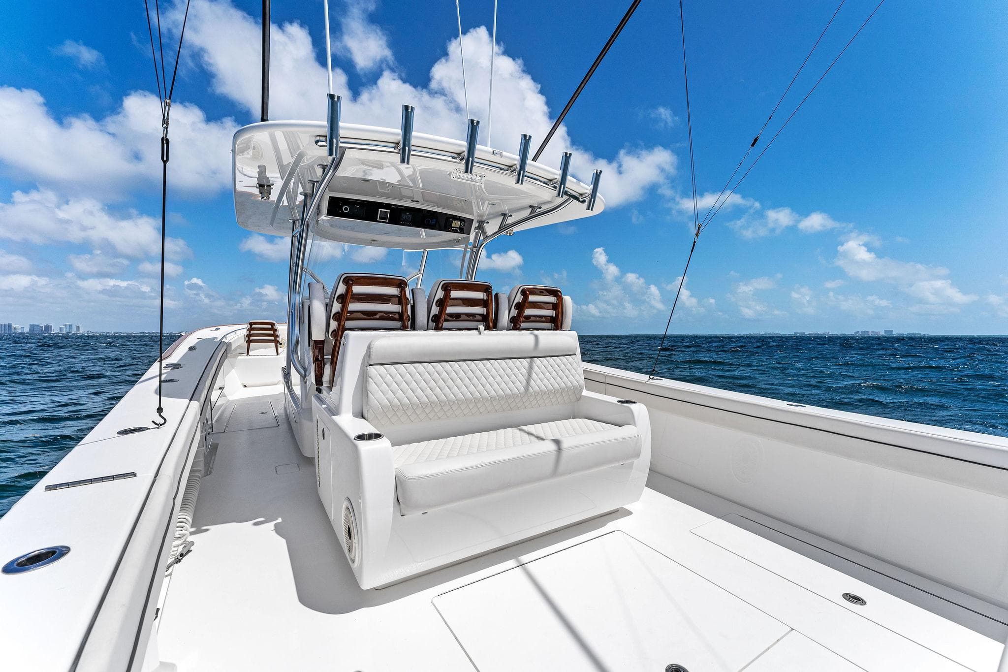 2021 Valhalla Boatworks V-41 on open sea, featuring sleek design and comfortable seating.