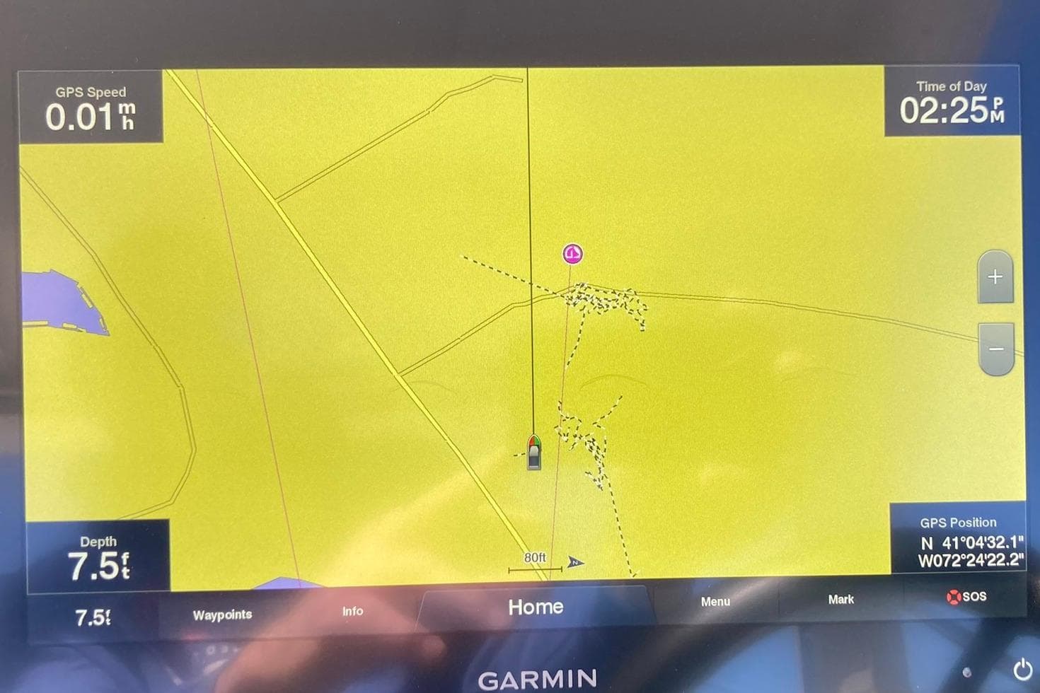 Garmin GPS display on Cobalt R30 boat, showing navigation details and coordinates.
