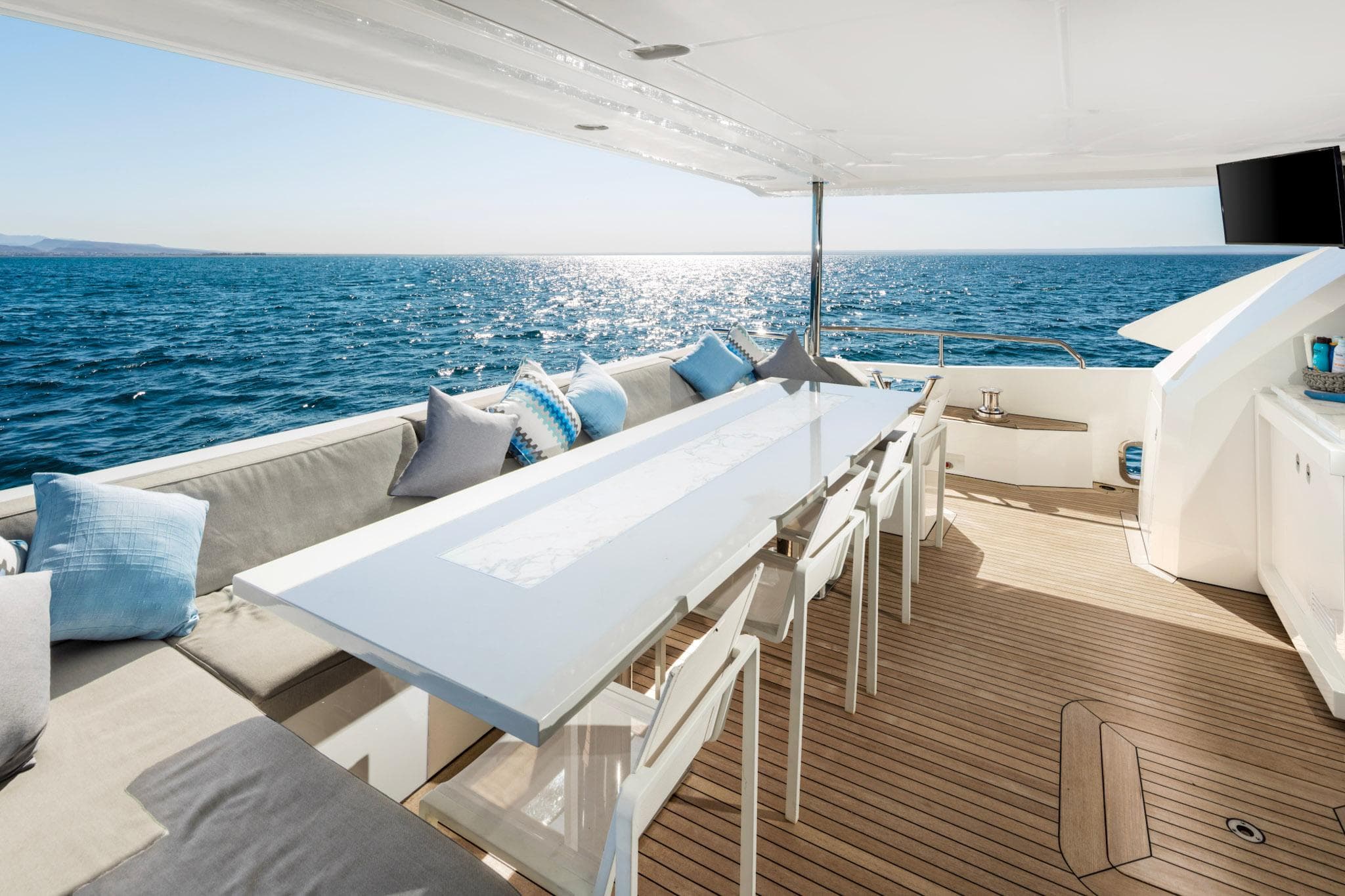 Luxurious Azimut Grande 30 Metri yacht deck with elegant seating and ocean view, 2017 model.