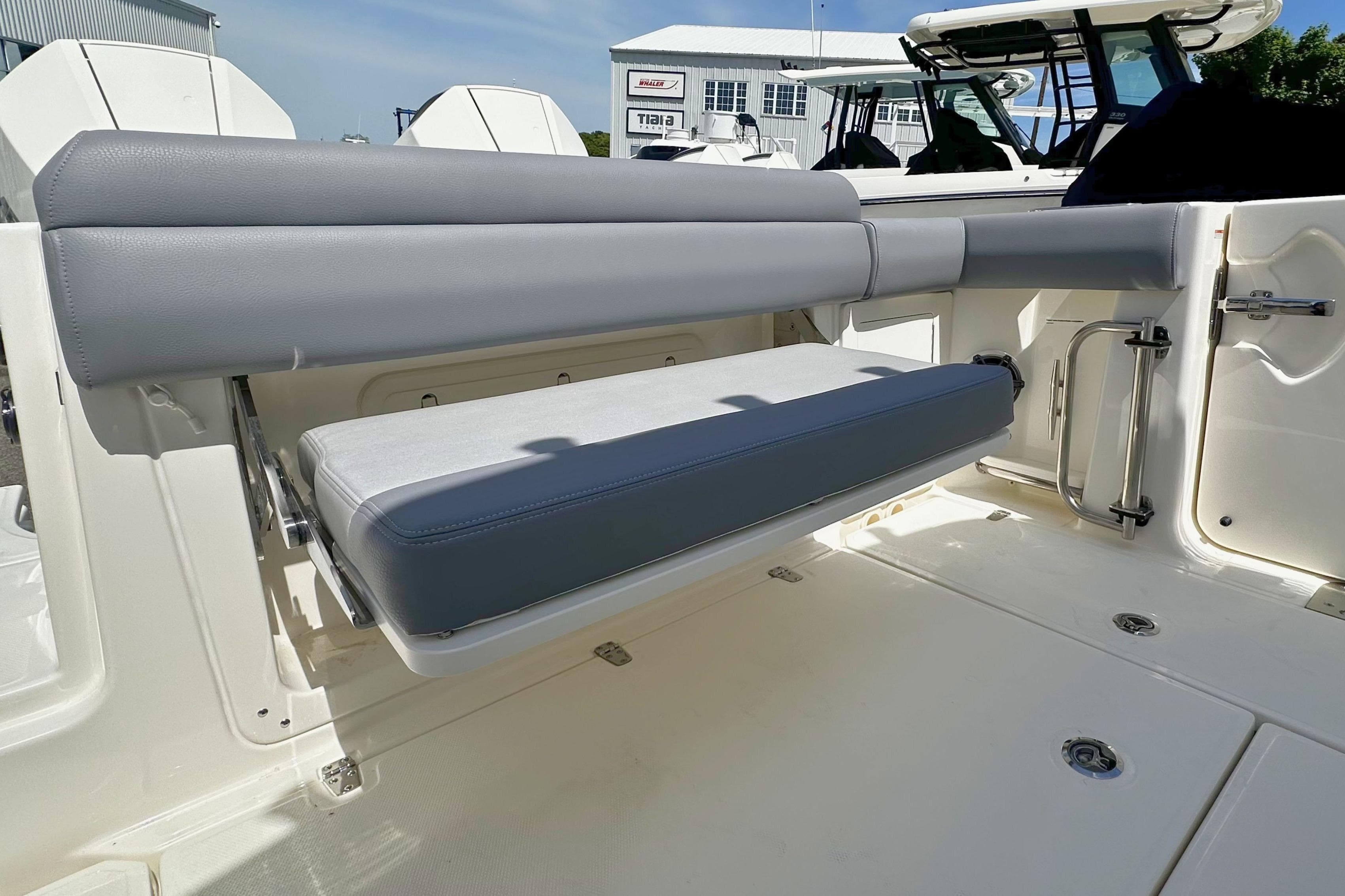 2026 Boston Whaler 280 Outrage boat interior with foldable seating and sleek design.