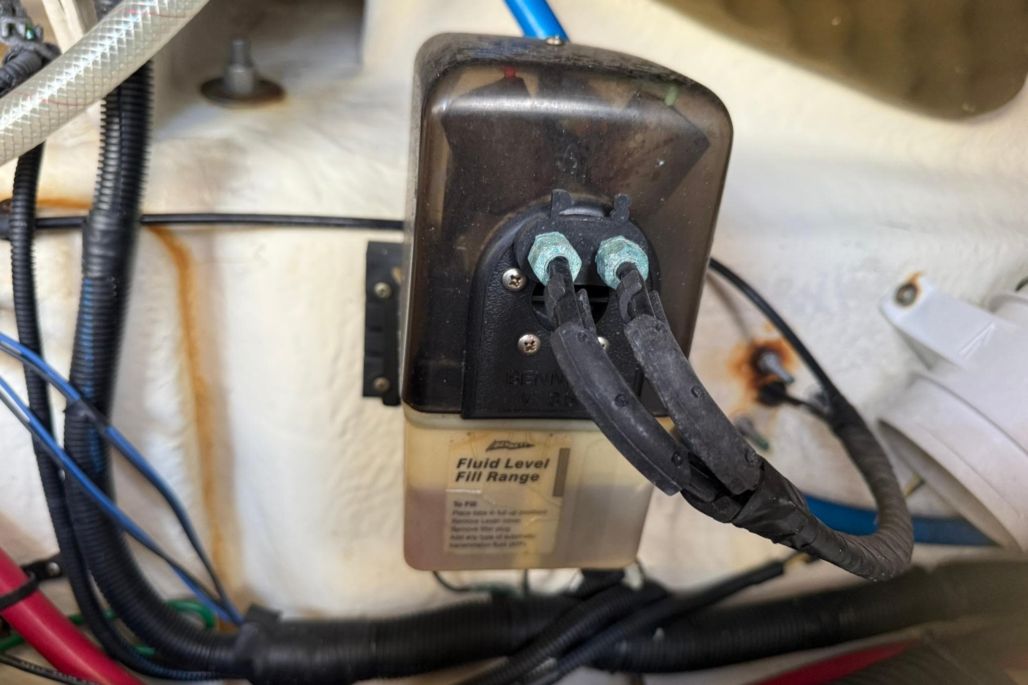 2006 Sea Ray 270 Amberjack fluid level sensor with connected wires in engine compartment.