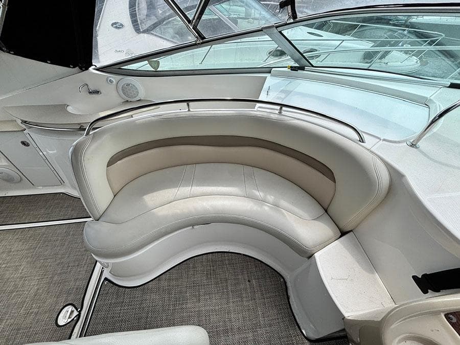2004 Chaparral 350 Signature boat interior with curved seating and modern design.