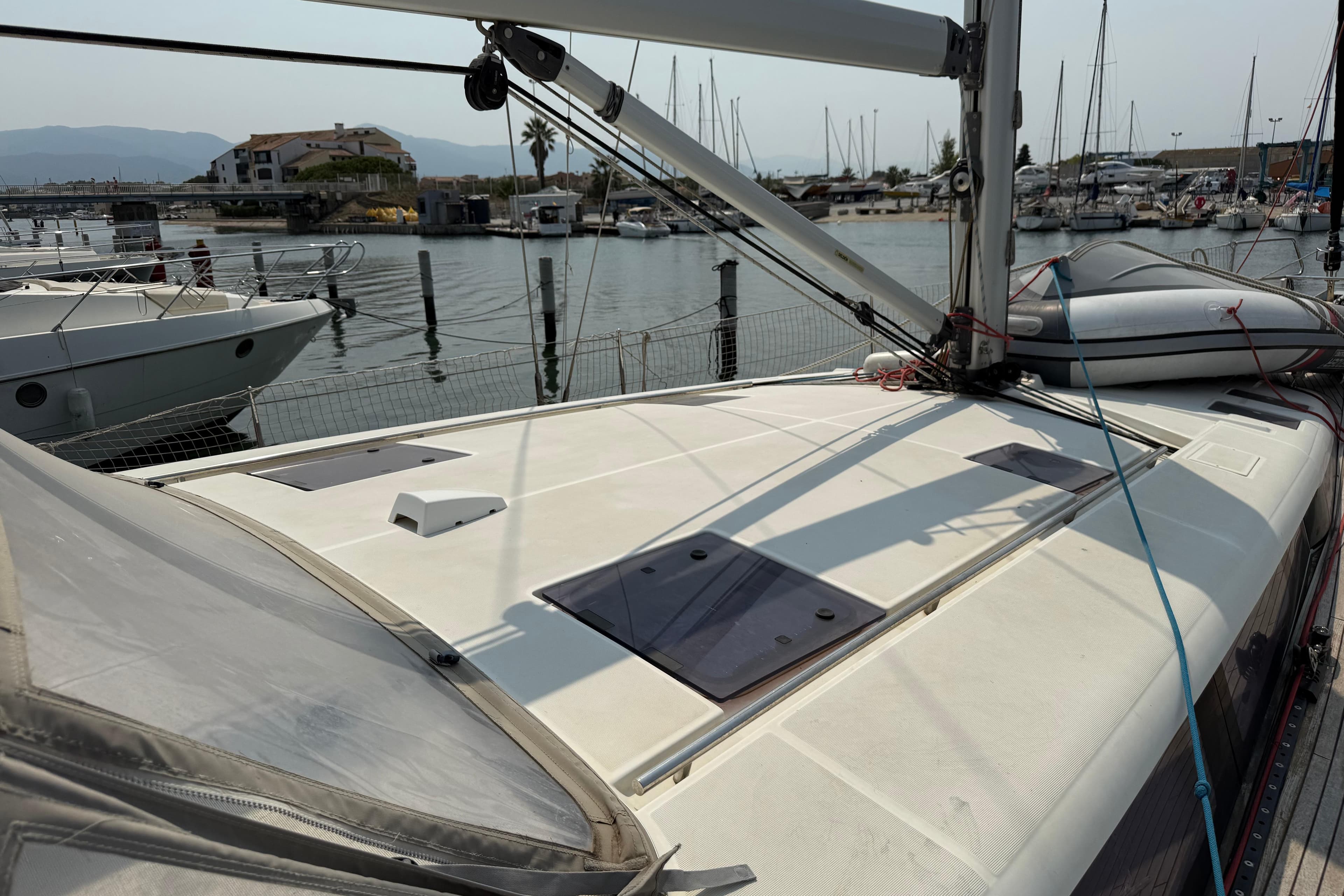 2018 Beneteau Sense 51 sailboat docked at marina, showcasing deck and rigging.