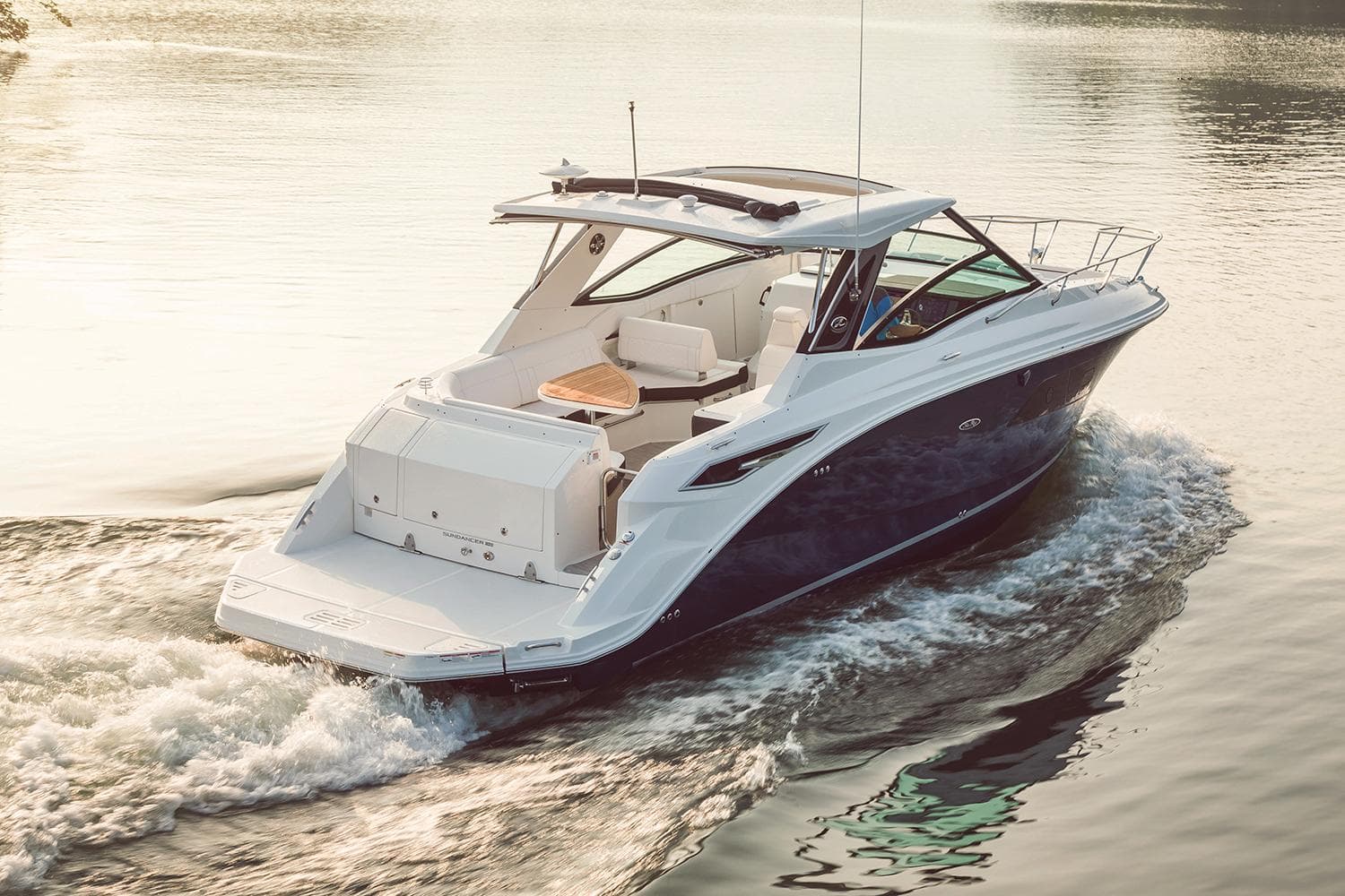 Manufacturer Provided Image: 2024 Sea Ray Sundancer 320 cruising on calm waters.