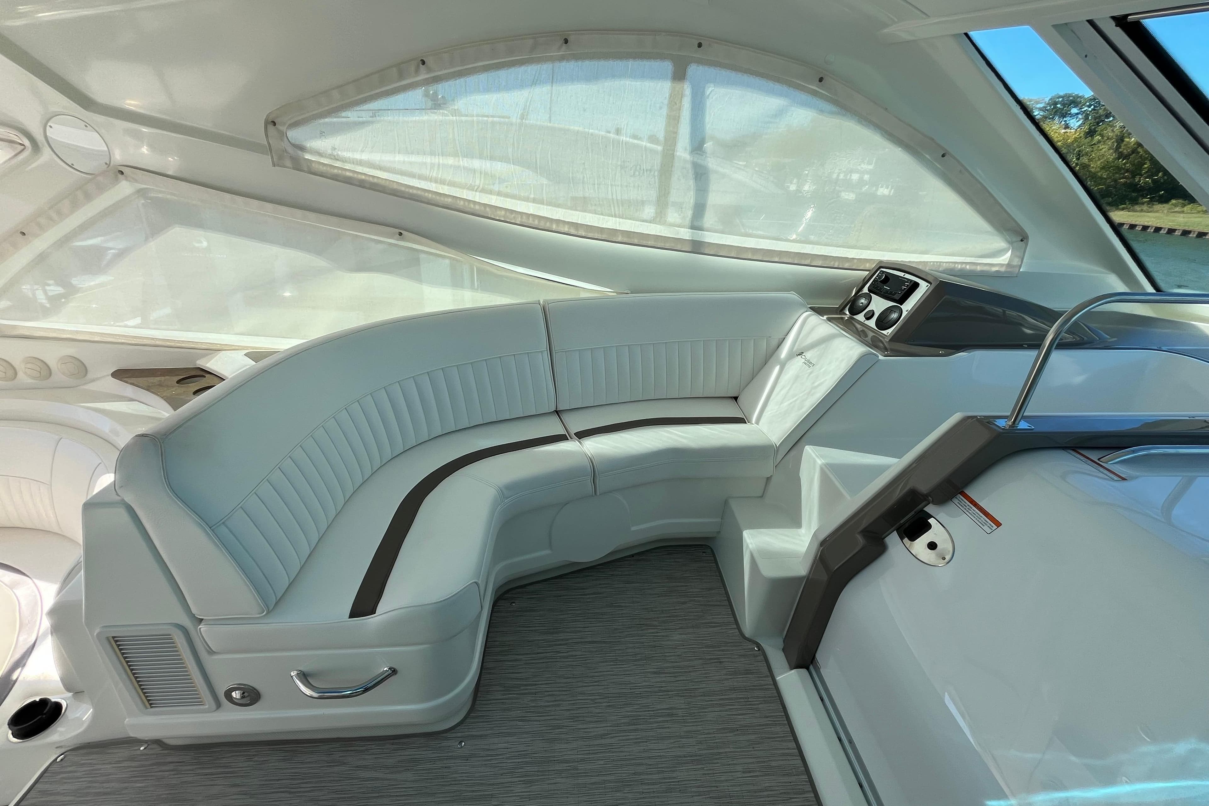 Luxurious interior of 2010 Cruisers Yachts 520 Sports Coupe with sleek seating and modern design.