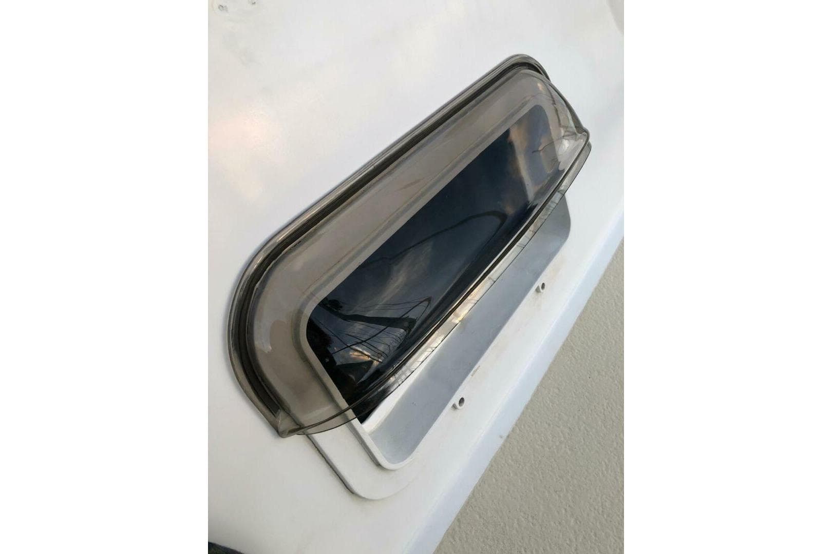 1981 Morgan 462 boat window with sleek, tinted design.