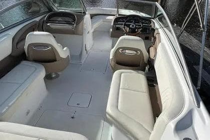 2008 Cobalt 252 boat interior with white seating and steering console.