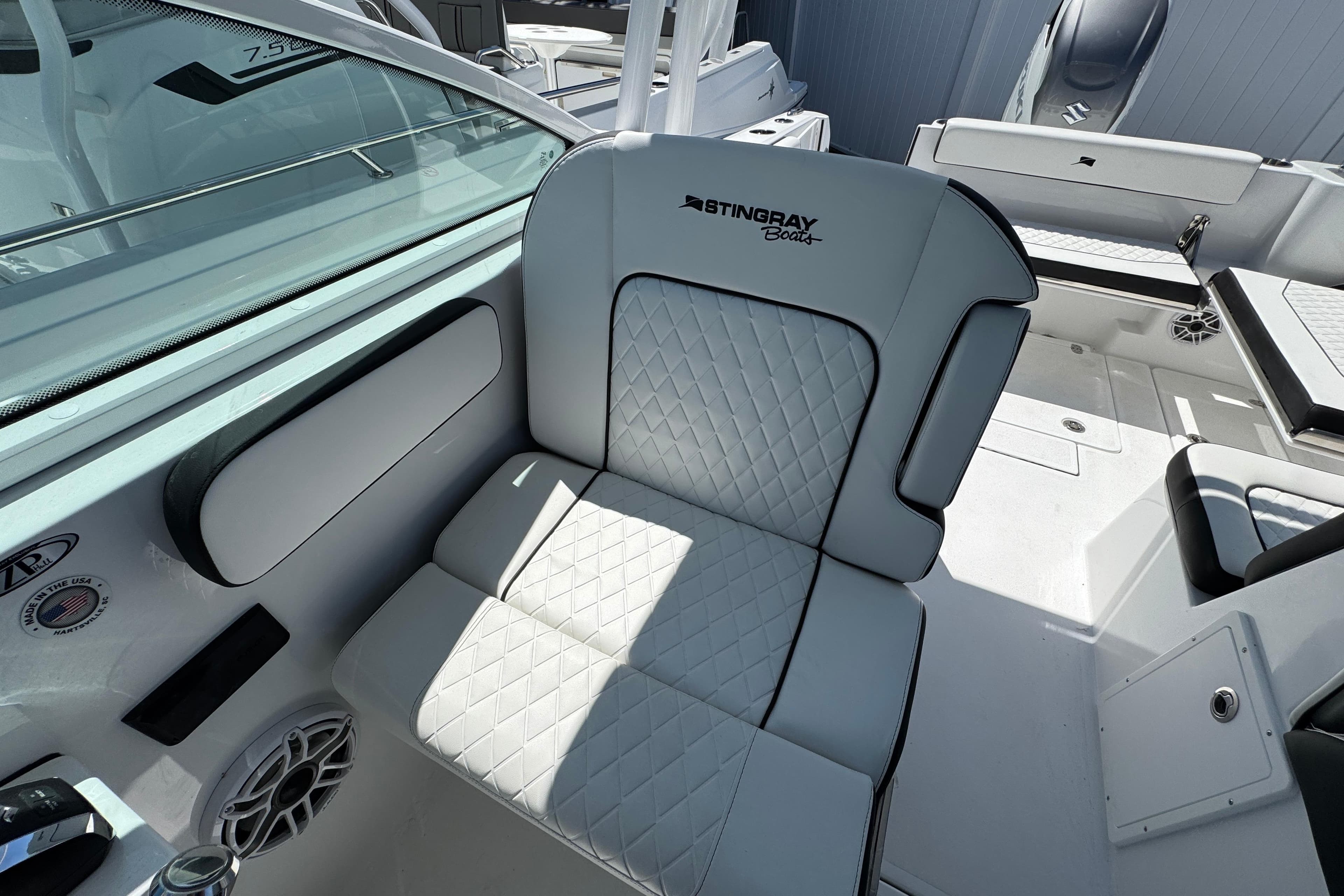 2026 Stingray 259 DC boat interior with quilted seating and modern design.