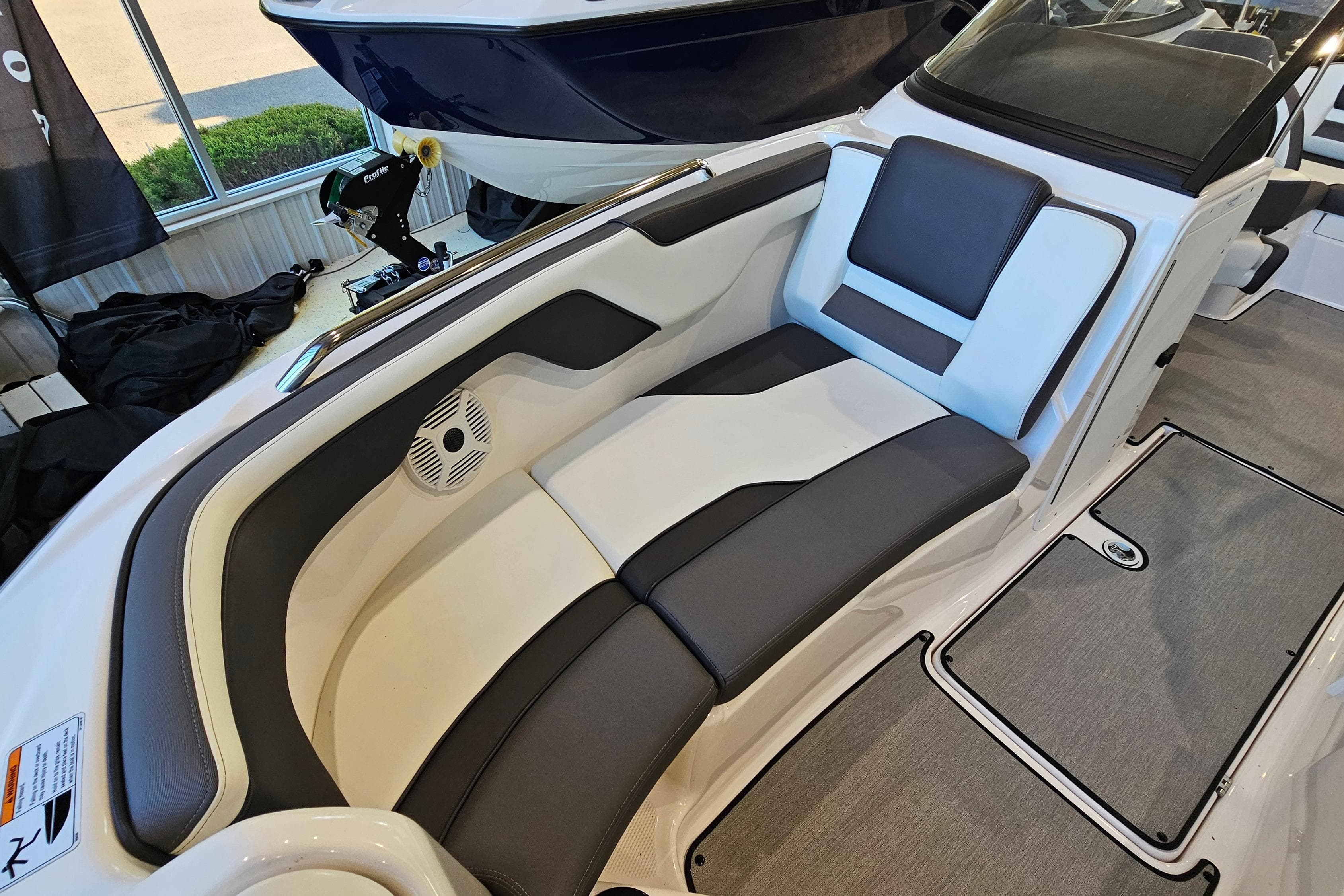 2022 Yamaha Boats SX210 interior with sleek seating and modern design.