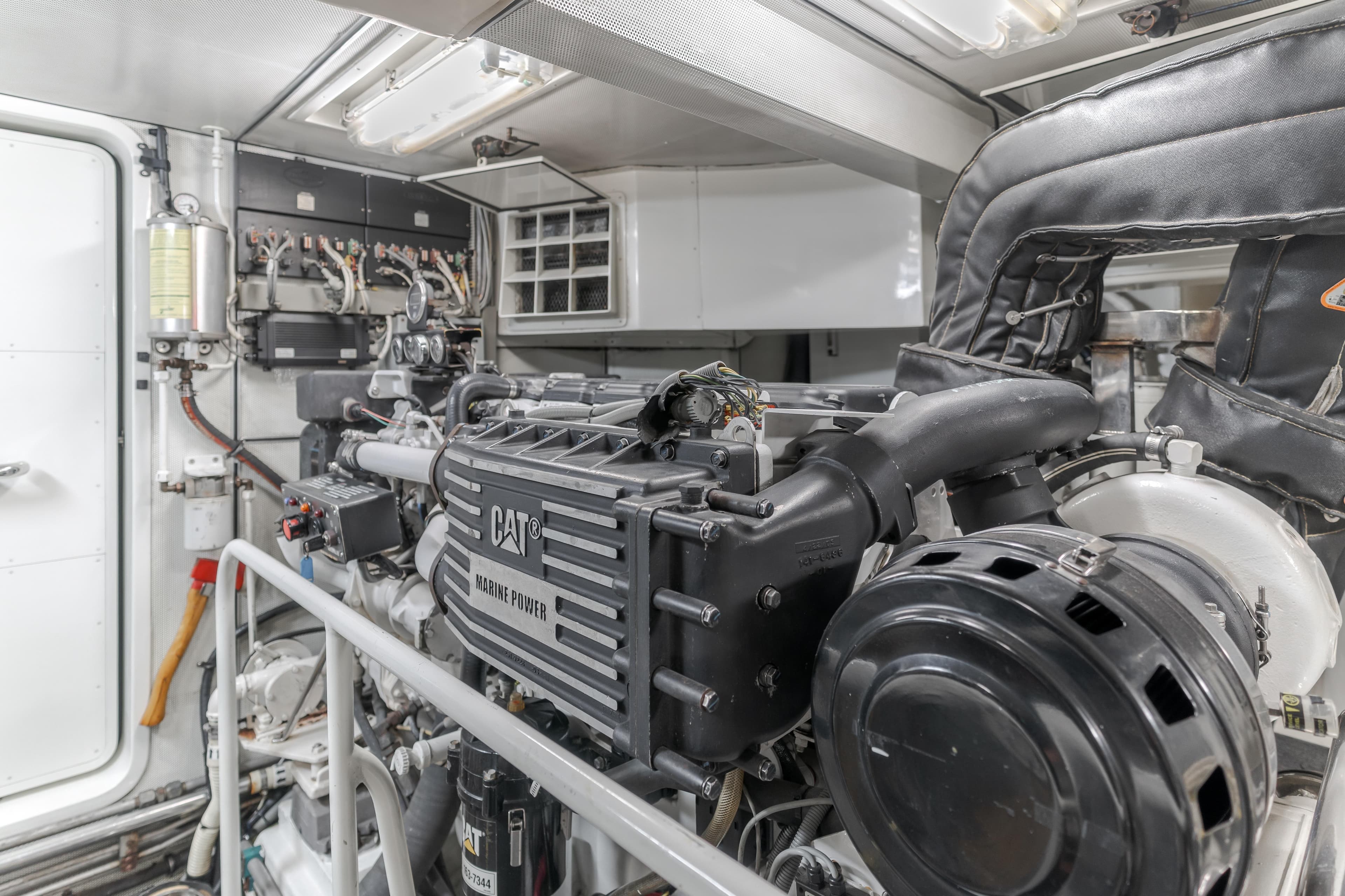 Engine room of 2006 Cheoy Lee 72' Raised Pilot House with CAT marine power engine.