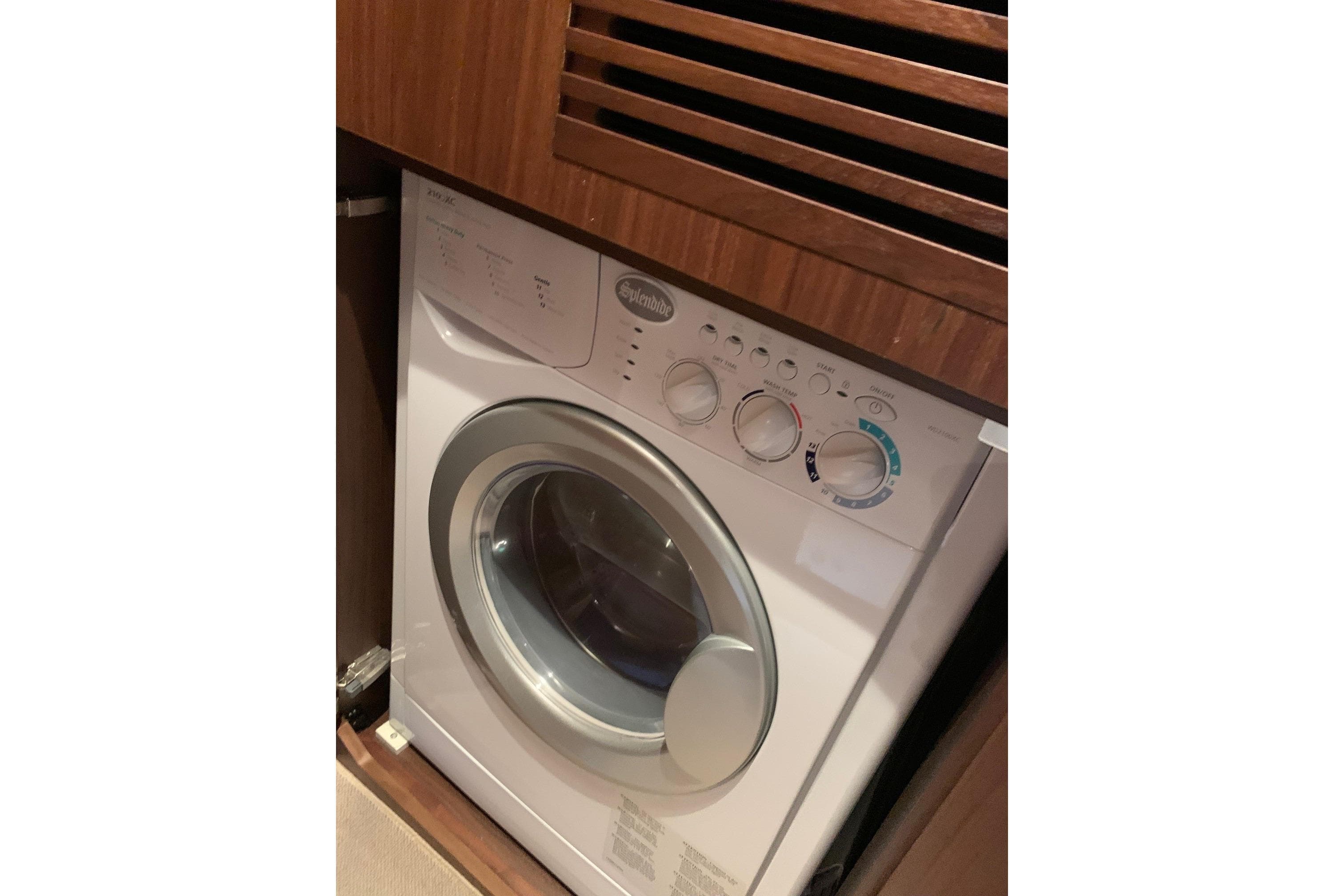 Front-loading washing machine in a wooden cabinet, Princess F49, 2019 model.