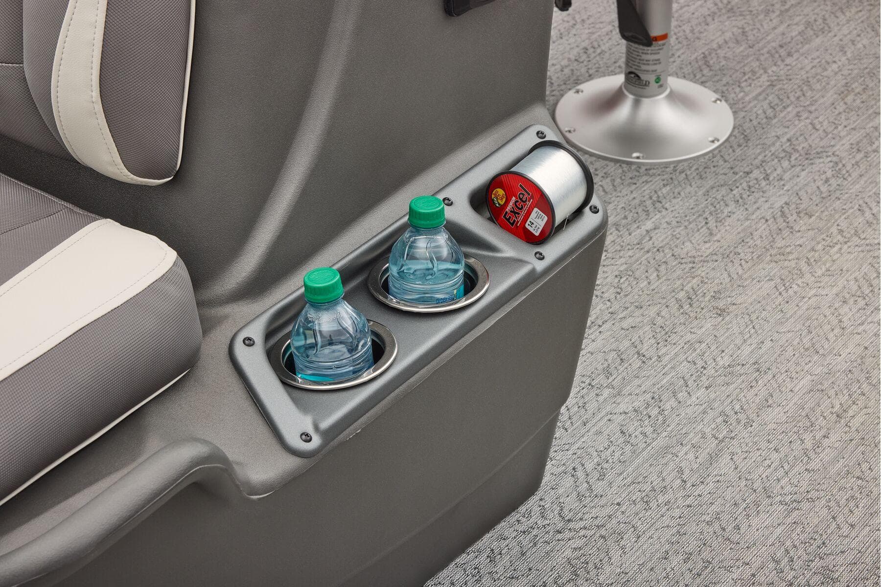 Manufacturer Provided Image: 2026 Sun Tracker Bass Buggy 16 XL Select cup holders with water bottles and fishing line.