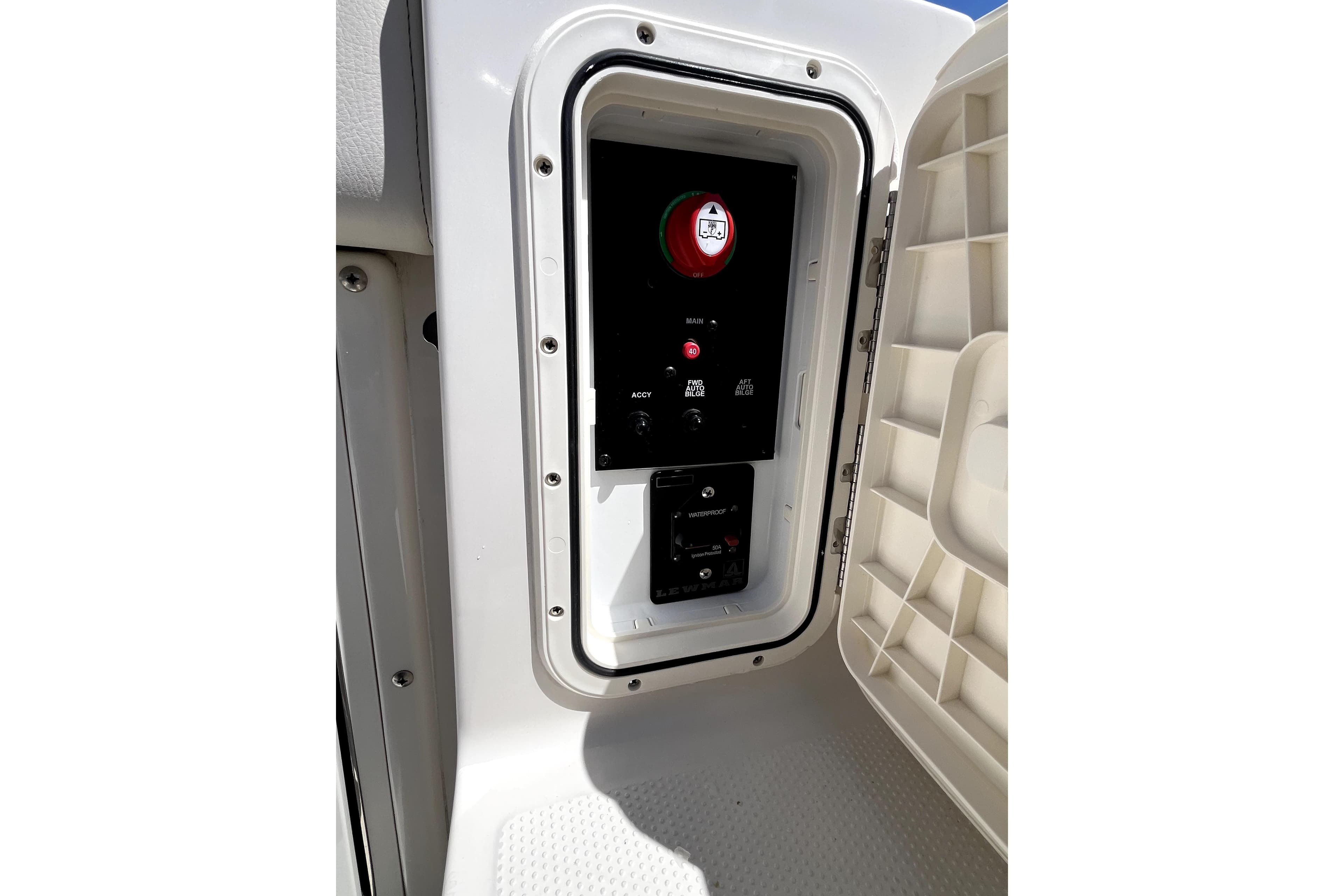 2024 Sailfish 245 DC boat control panel with switches and indicators.