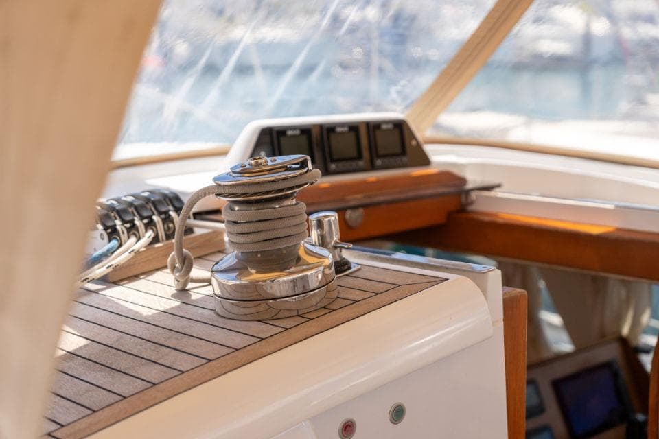 Interior view of a 2008 Discovery 55 yacht cockpit with winch and navigation instruments.