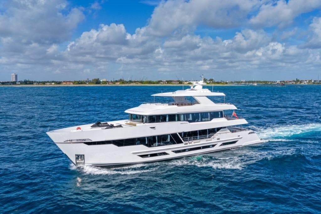 Luxurious 2026 Hargrave E Series yacht cruising on a sunny day in open waters.