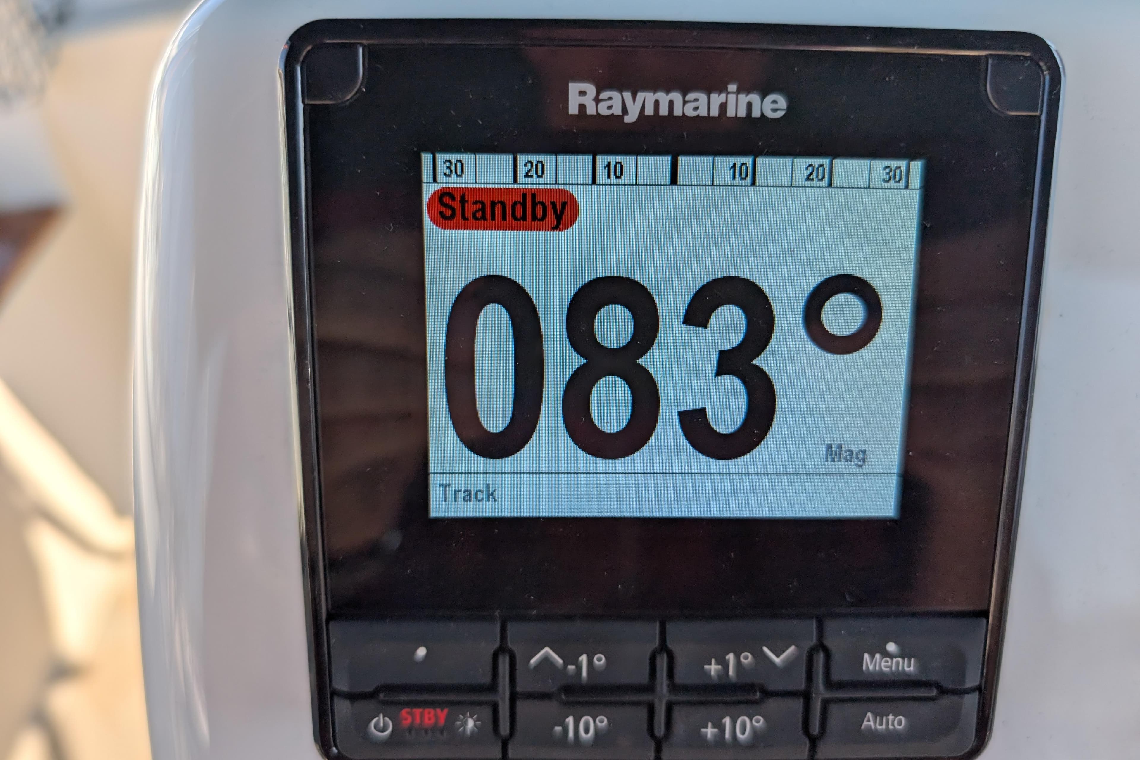 Raymarine display showing 083° heading on Island Packet 320, 1999 model.