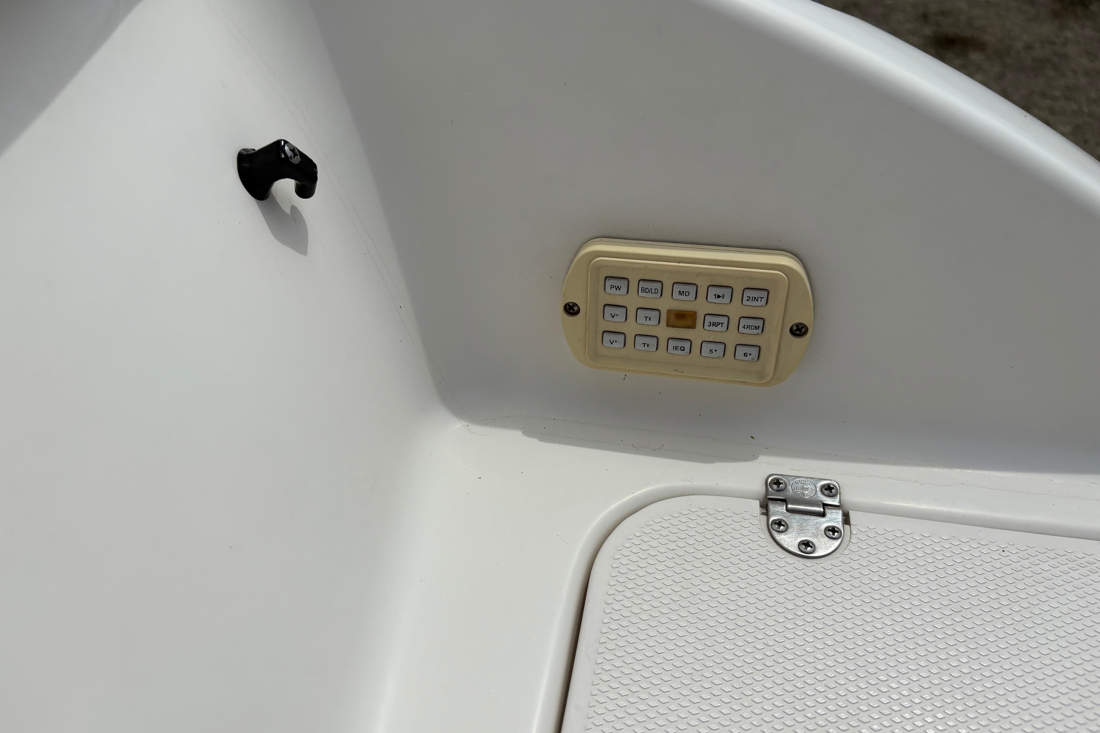 Control panel on a 2003 Chaparral 210 SS boat interior.