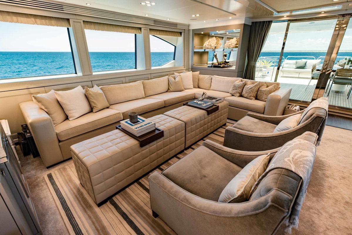 Luxurious Sunseeker 131 Yacht interior with elegant seating and ocean view, 2012 model.