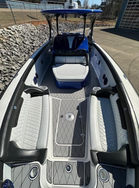 2019 Mystic Powerboats M4200 with luxurious seating and sleek design.