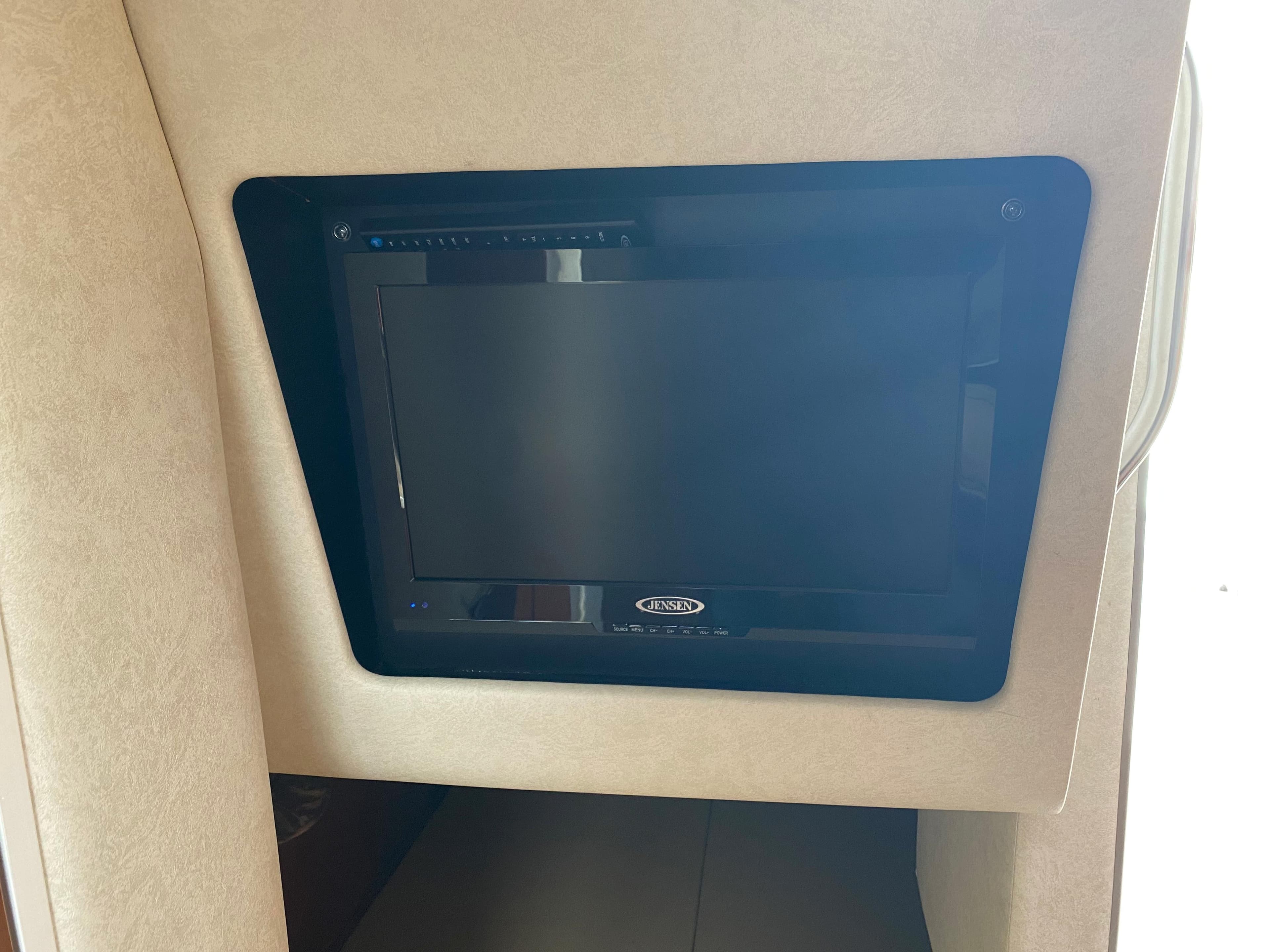 Interior TV in a 2012 Sea Ray Sundancer 280 boat.