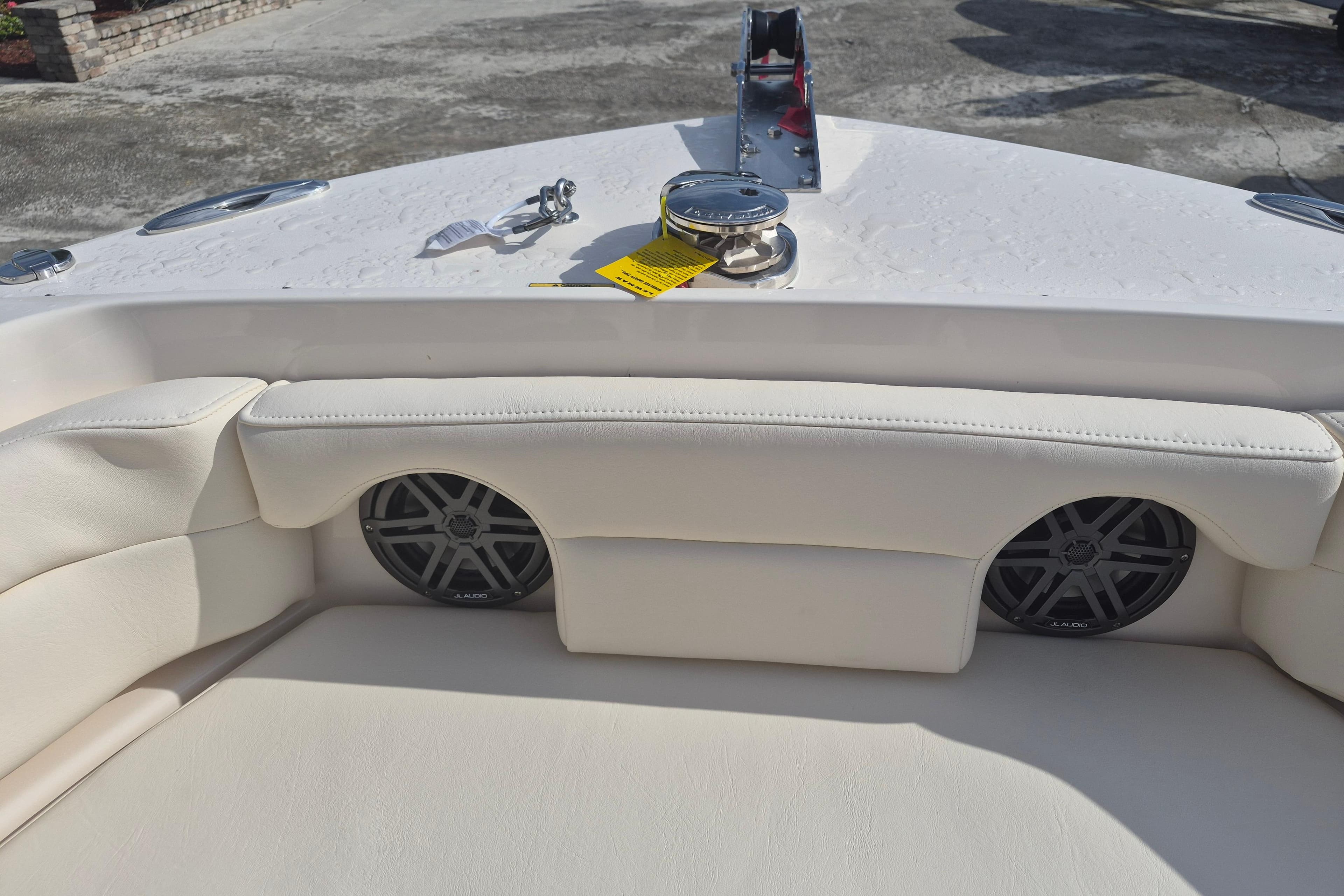 2026 Grady-White Freedom 235 boat interior with speakers and seating.