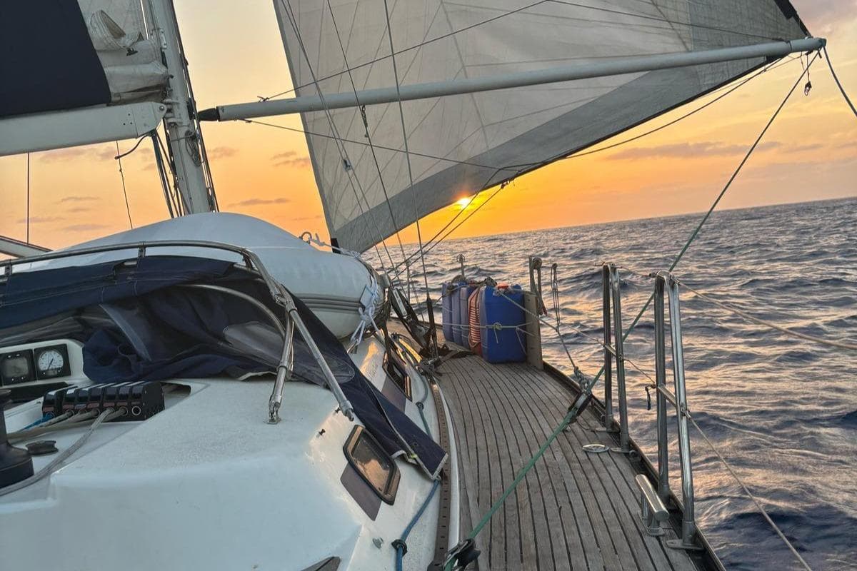 Sailing yacht X-Yachts 442 MK II, 2000 model, at sunset on open sea.