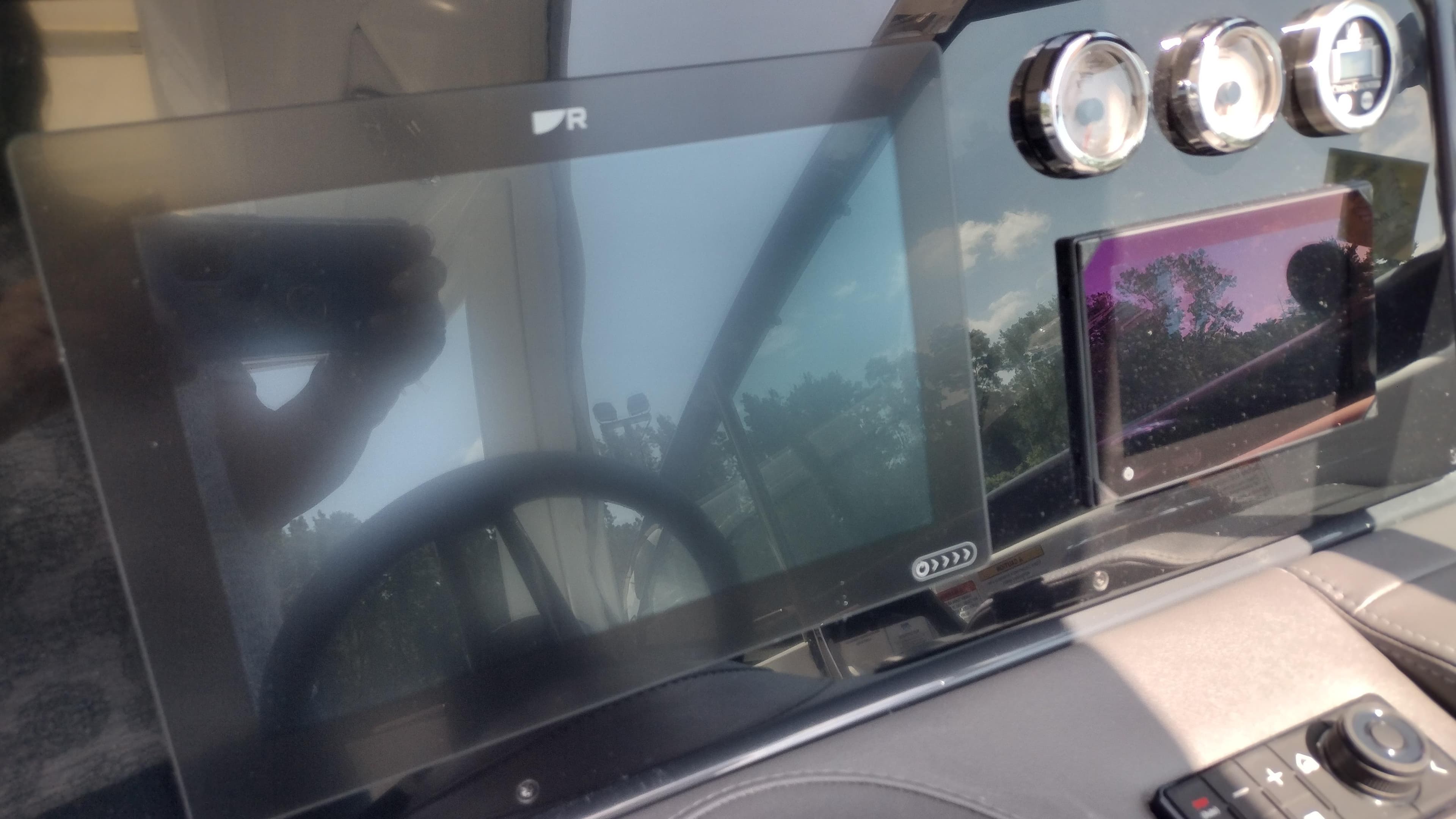 Dashboard of a 2026 Formula 330 CBR boat with digital displays and gauges.