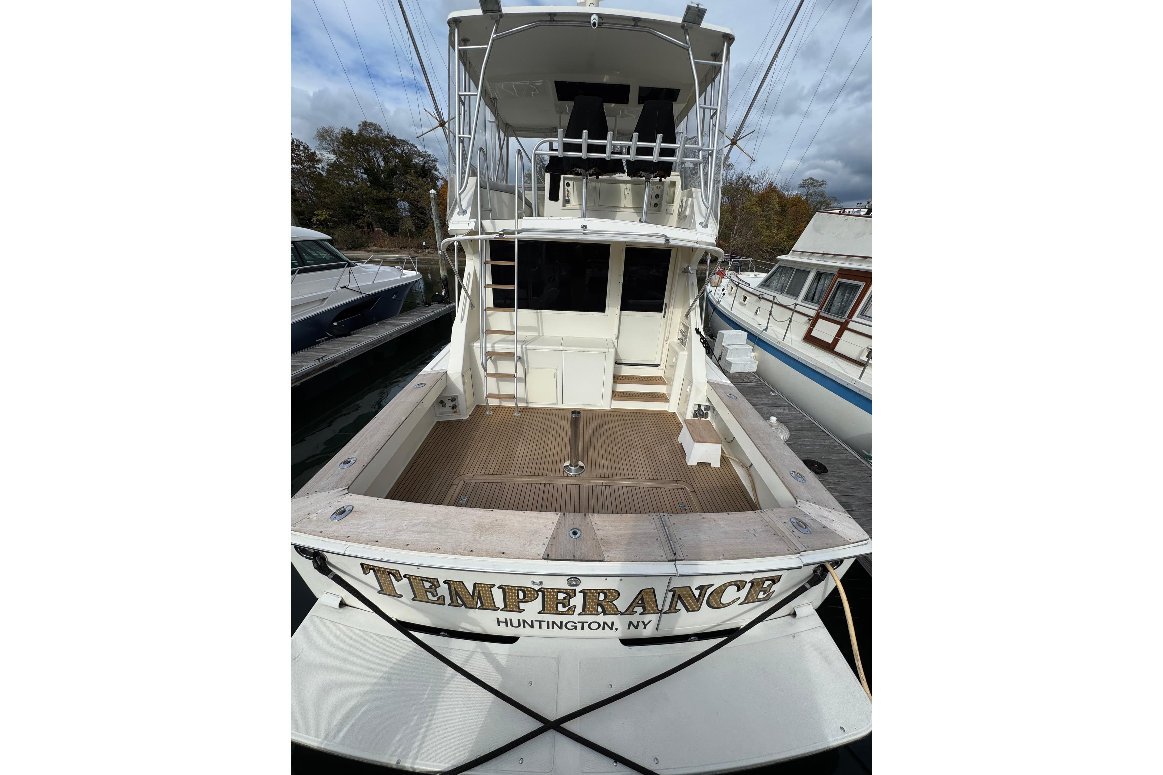 1991 Viking 53 Convertible yacht docked in Huntington, NY, named "Temperance."