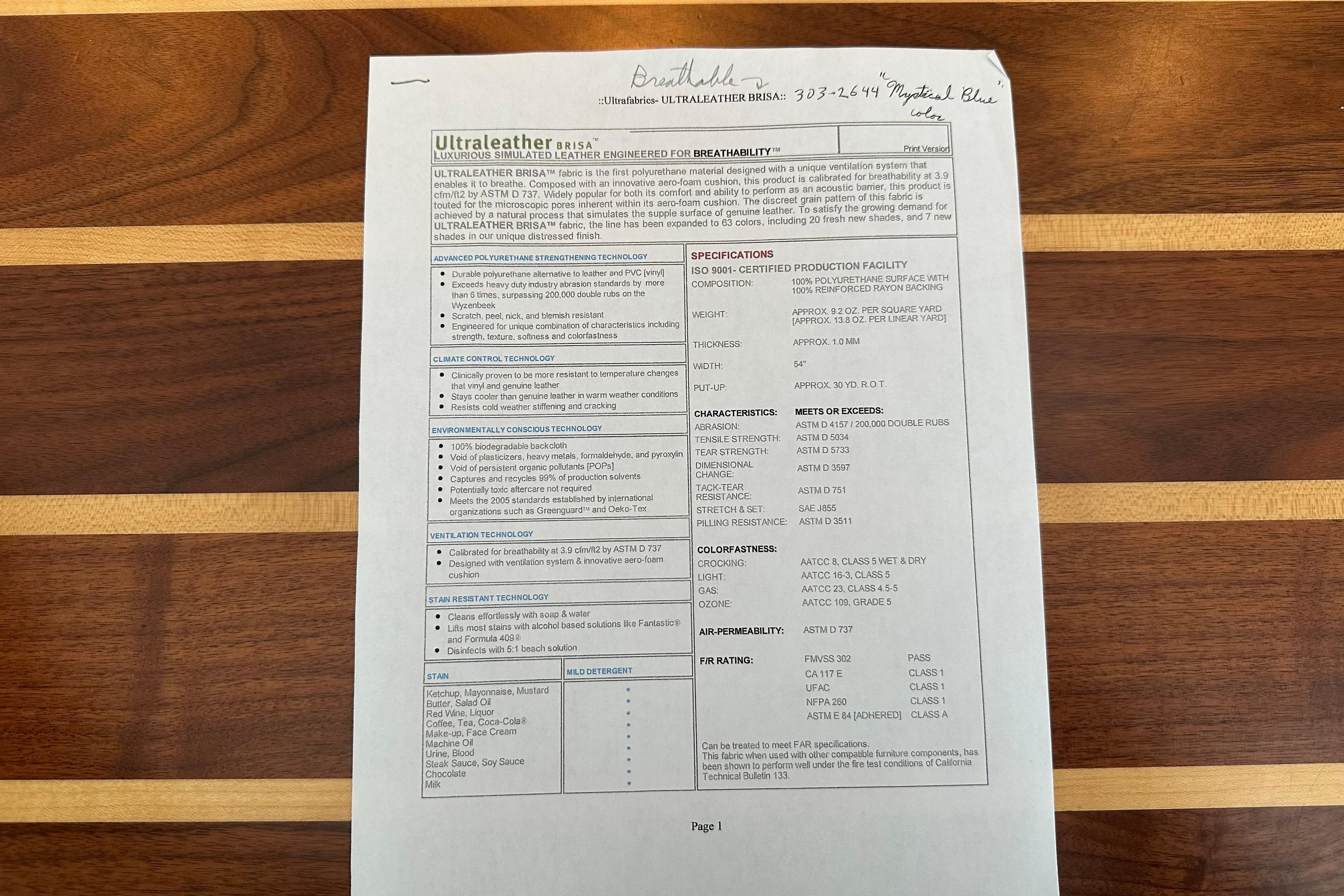 Document on wooden table detailing Ultrafabrics Brisa specifications and features.