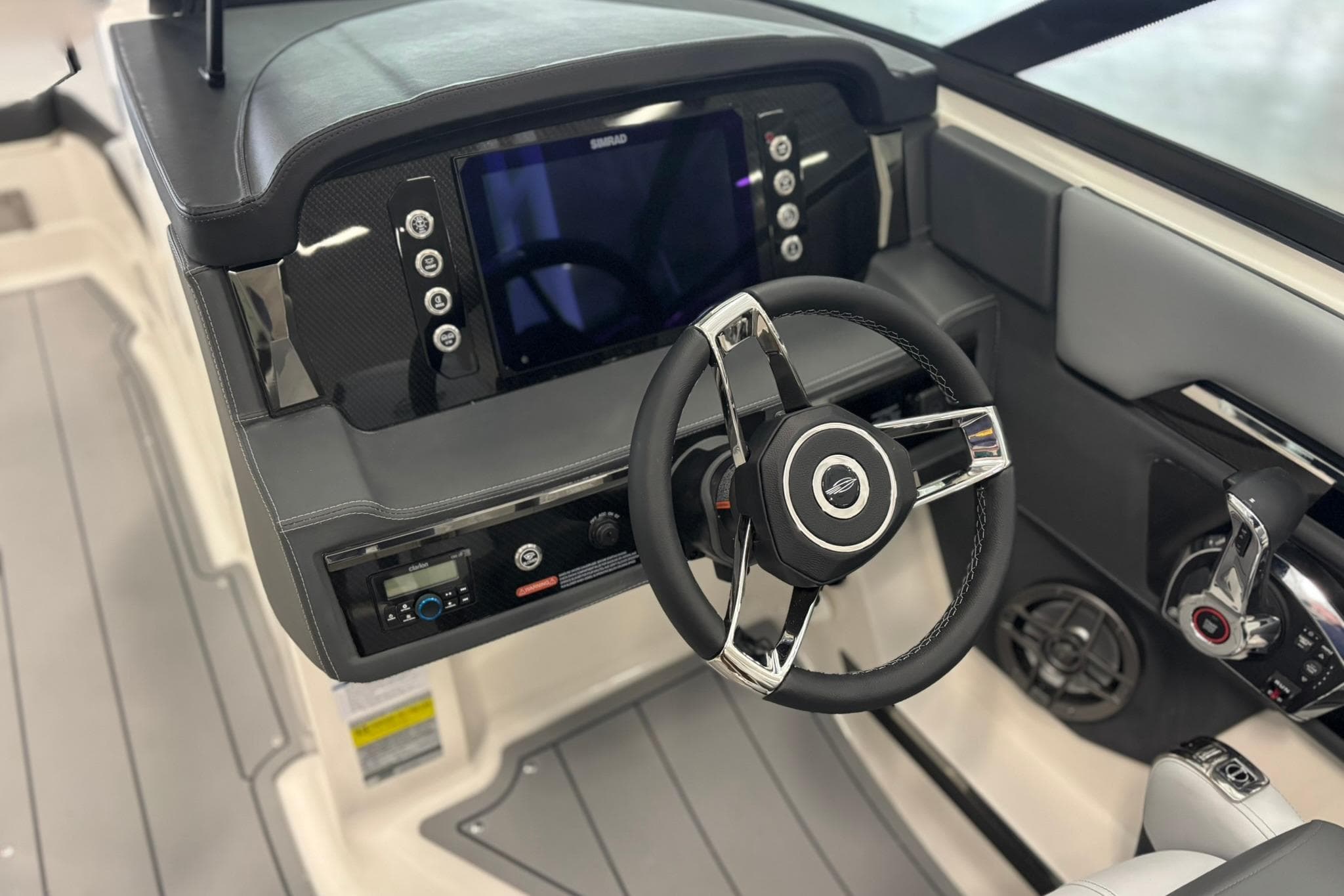 2026 Chaparral SSX 4 boat dashboard with steering wheel and control panel.