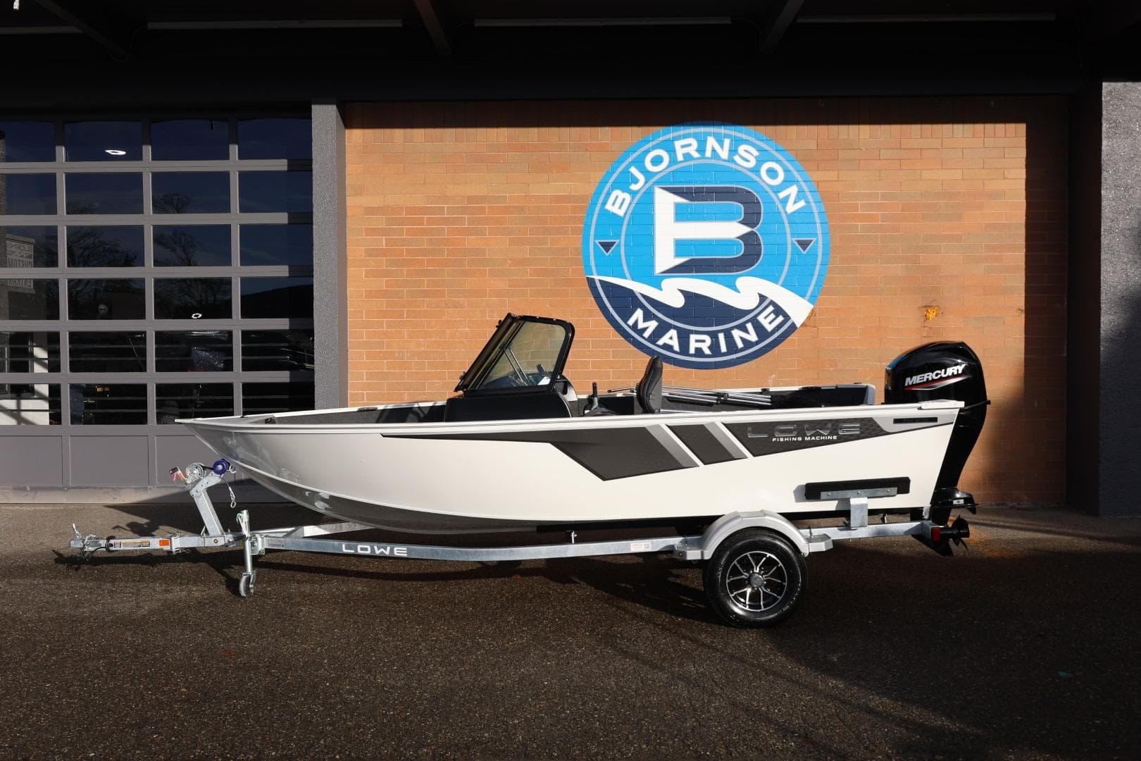 2026 Lowe Fishing Machine 1675 WT boat on trailer at Bjornson Marine.