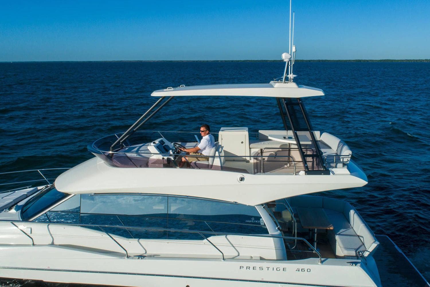 Manufacturer Provided Image: Prestige 460 yacht cruising on open sea, 2025 model.