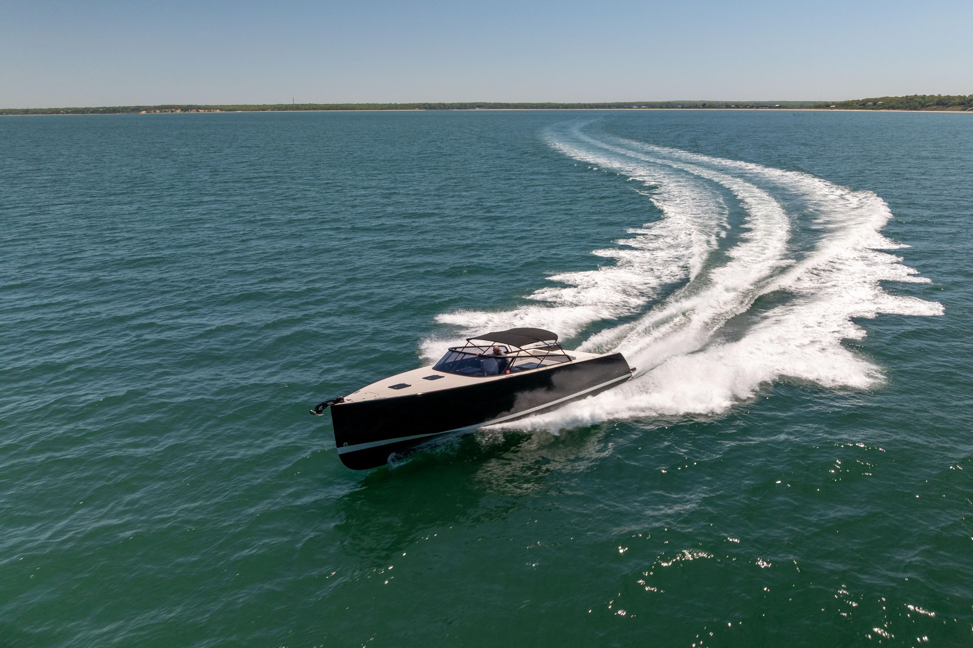 2016 VanDutch 40 yacht cruising swiftly on open water.