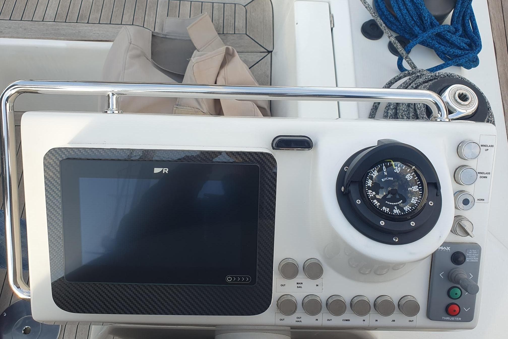 Control panel of a 2007 Messrs Solaris Yachts 53DS with compass and navigation screen.
