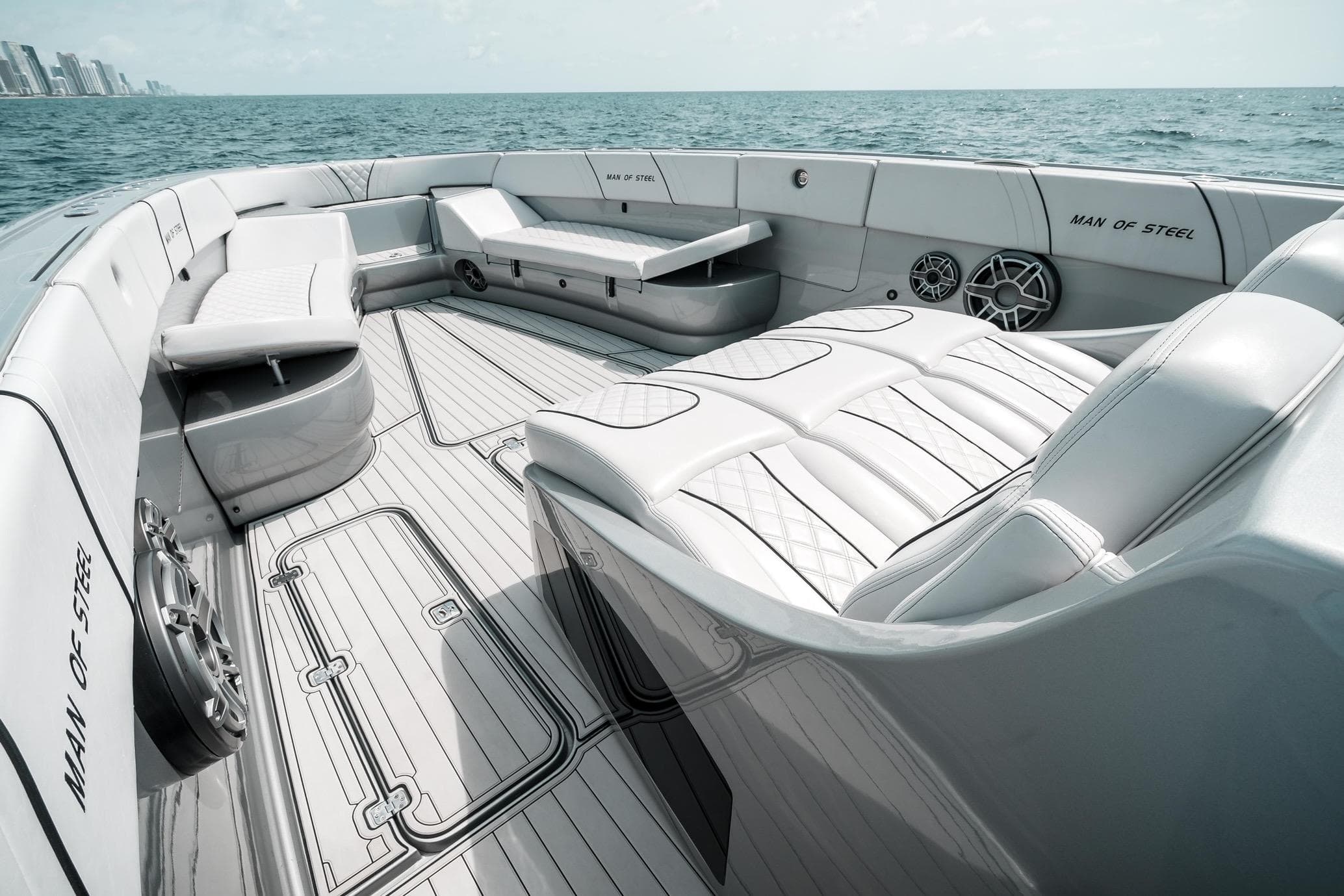 Luxurious 2022 Midnight Express 43 Open yacht interior with sleek seating and ocean view.