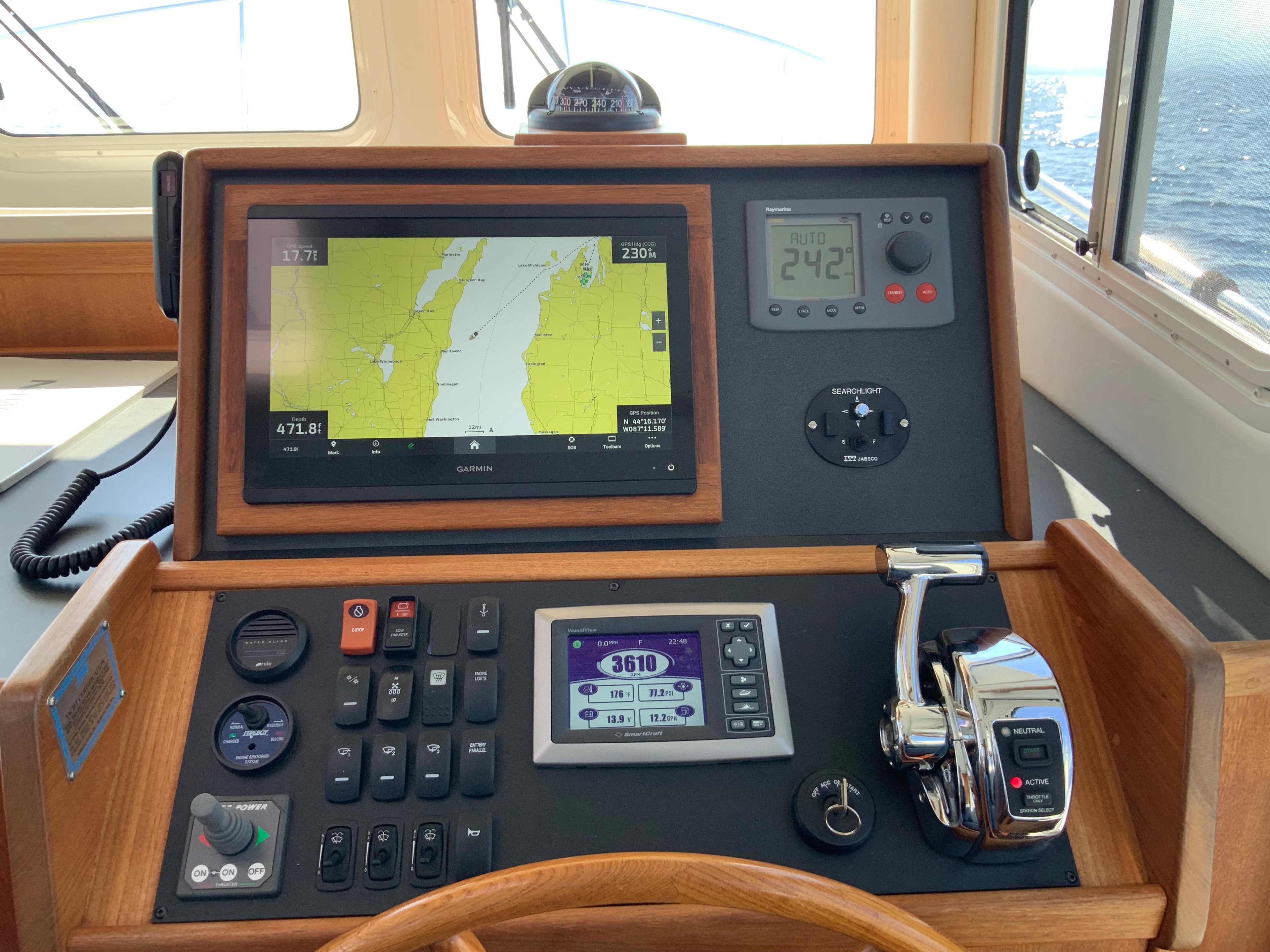 Helm of 2010 Nordic Tug 32 with navigation and control systems.
