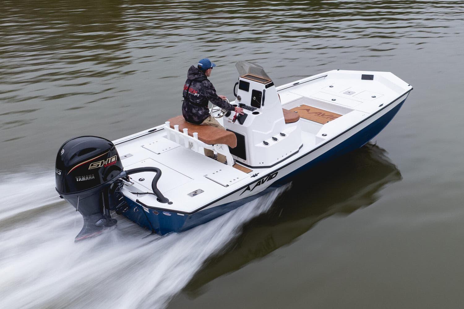 Manufacturer Provided Image: Avid 207 Recon 2026 boat cruising on water with Yamaha engine.
