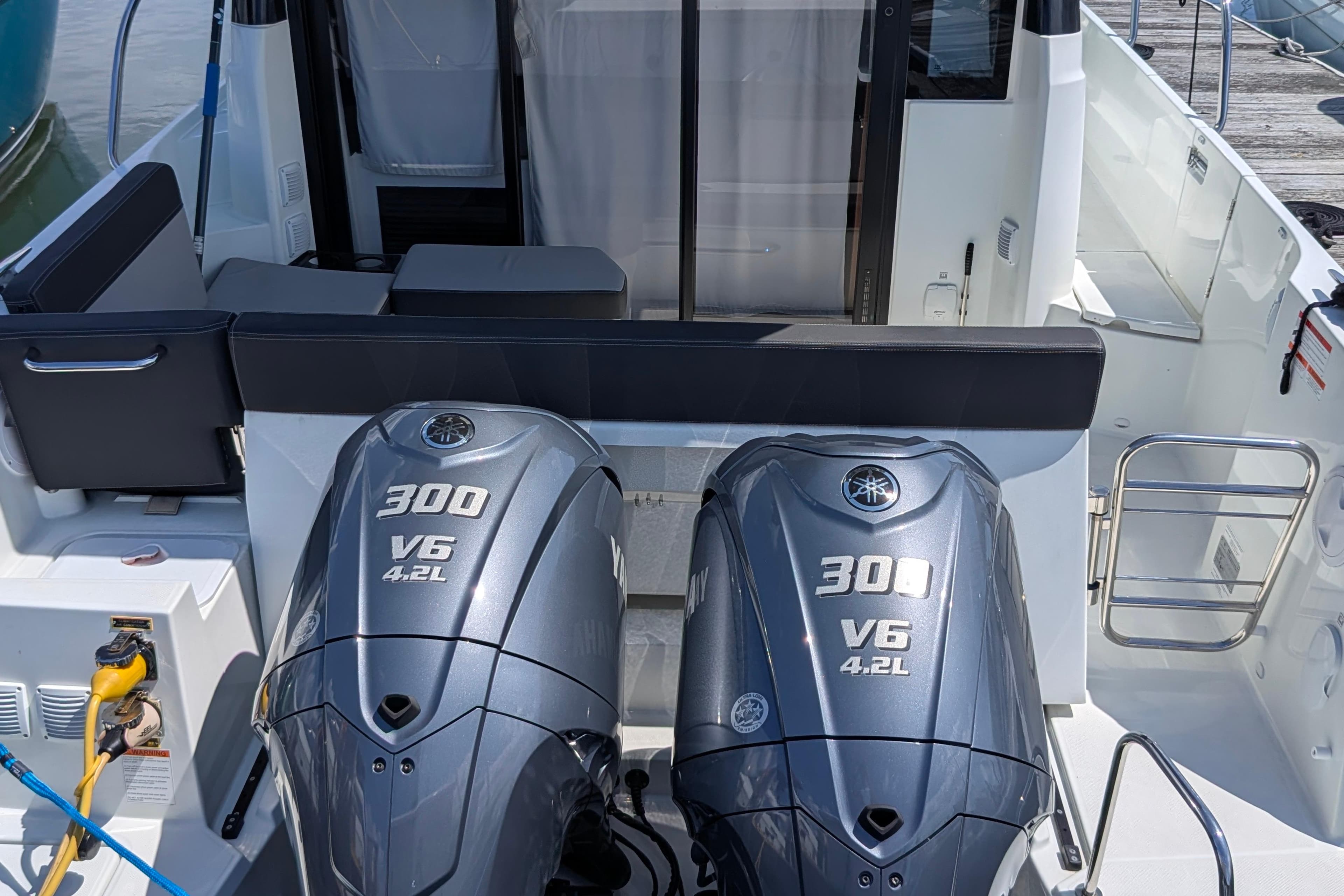 2023 Jeanneau NC Weekender 1095 with dual Yamaha 300 V6 outboard engines.